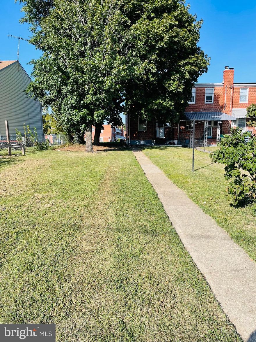 Step into a home filled with tons of natural light, new flooring, and plenty of room for family and friends. The main floor offers a spacious living room, dining room, and kitchen. The kitchen features plenty of cabinets and countertops, and all appliances. On the second floor is a large primary bedroom with a good sized closet, two decent sized additional bedrooms, and a full bath. The lower level offers additional living space featuring  laundry, storage, and a walk-out to the generous backyard. From the main floor step outside to a yard filled with possibilities. Convenient off-street parking and a rear parking area add to the practicality of this charming home. New water heater recently replaced. Ideally located near shopping, dining, and commuter routes, this property presents a fantastic opportunity for new homeowners seeking comfort and convenience.