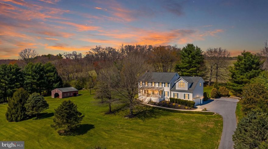 The Ultimate in Versatility and Country Elegance. Nestled on 2.67 acres of pristine, cleared land in the heart of Parkton’s coveted "Hereford Zone," this classic Colonial (built in 1995) offers a rare combination of historic charm and modern multi-generational functionality. Lovingly maintained by the original owners, this 5-bedroom, 4.5-bathroom residence has been thoughtfully expanded to accommodate every stage of life.

The Independent In-Law / Au Pair Suite (ADU)
What truly sets this property apart is the fully independent living suite located above the garage. This features its own separate entrance, a complete kitchenette, and a full bathroom. Whether used as a dedicated in-law suite, a space for college students, or a professional-grade studio, this addition provides true autonomy from the main household.

Exceptional Living & Entertaining Spaces
The main level boasts a "fabulous flow" specifically designed for entertaining. The heart of the home extends into a significant rear addition that leads directly to a massive stone patio and a relaxing hot tub. For quiet evenings, the extra-large front porch offers a front-row seat to spectacular Maryland sunsets.

Finished Walk-Out Basement: Significant additional living space featuring a full bathroom, separate eating area, and flexible zones that could easily serve as a 6th bedroom or guest wing.

The Barn (25x30 ft): A versatile outbuilding with endless possibilities—from a workspace, or greenhouse to a functional space for livestock, car collections, or heavy equipment.

Historic Relevance & Lifestyle
Located in the prestigious Hereford School District (Seventh District Elementary, Hereford Middle, and Hereford High), this home is perfect for a family looking to build a legacy. The surrounding area is steeped in American history; the neighboring church at the foot of the driveway dates back to 1863 and served as a significant site on the Underground Railroad.

Technical Specifications & Recent Upgrades

Mechanicals: New Water Pump/Tank System (March 2026); New Hot Water Heater (March 2026).

HVAC: New Heat Pump installed June 2019; Oil and Heat Pump service.

Electrical: 400 Amp service with full generator capability and a dedicated generator hookup/outlet in the garage.

Kitchen: Brand new stove/oven equipped with built-in air fryer technology.

Roof: High-quality roof approximately 10 years old.

Why 21310 W Liberty Rd?
This is more than a home; it’s a private compound that supports multi-generational living, home-based business needs, and outdoor recreation. From sleigh riding on the gentle slopes of the 2.67-acre lot to climbing trees and building forts, it is the quintessential setting for the next generation.