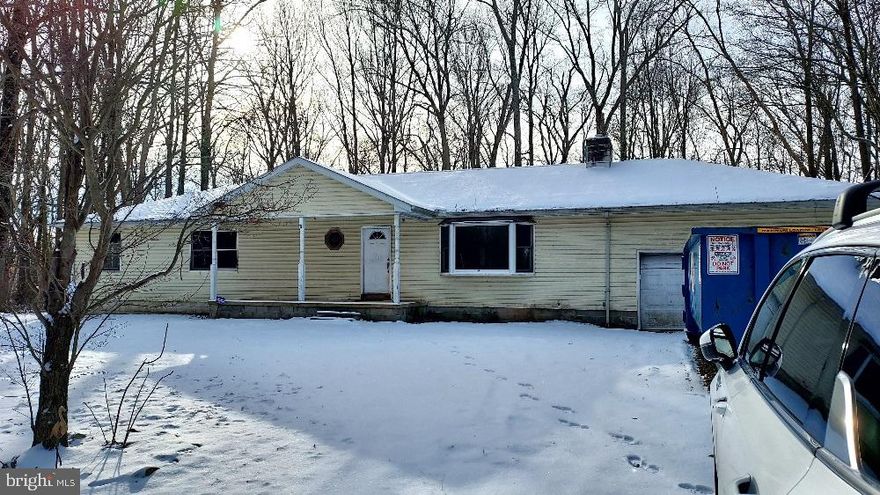 LOOK!!!! 5 Bedroom, 2 Bath, Rancher with 2 Car Garage and Full Basement on 3.31 Acres in Chesapeake City!!!! Just Outside of Town and Within 1 Mile of All Schools, Shopping, VFW and Post Office.  Yes, it needs Renovating, TLC and Updating, But It's Priced To Sell, So Don't Wait!! All Systems Functional, Propane Forced Air Heating Unit and Water Heater Are Fairly New! This Can Be a Flippers Dream Or a Great First Home If Your Handy with Renovations! Being Sold As-Is