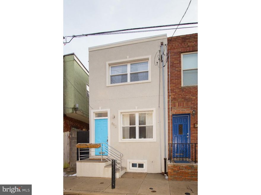You'll fall in love with this 3 bedroom, 1.5 bath home in the bustling neighborhood of Passyunk Square! The home was rehabbed in 2013 and has been lovingly maintained ever since. Walk into the open floor plan complete with a powder room, exposed brick, modern railings and floating staircase. The spacious kitchen offers a farmers sink, marble back splash, 5 burner stove, french door refrigerator and plenty of space for an island or breakfast bar. Upstairs you'll find 3 bedrooms, each with their own generously sized closets. Laundry is located in the basement as well as plenty of storage space. The front half of the full basement has been partially finished with PVC flooring tiles creating versatile additional space. The large outdoor patio area is perfect for hosting summer cookouts and is full of cheery color and character from the hand painted mural. Recent upgrades to the property include a new roof installed in 2016 and new sewer line out to the street in 2014. Conveniently situated on a quiet side street but just a short walk to some of the most popular dining destinations in the city, subway access, the Italian Market and everything else that Passyunk Square has to offer!