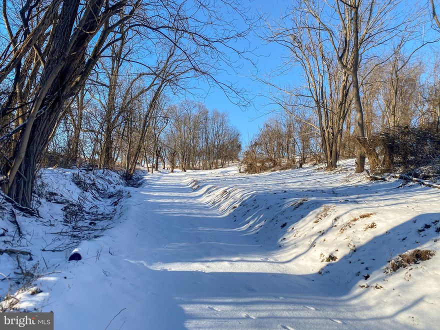 This 1.87 acre lot is ready for your new home to be built, tucked back in, away from the road, surrounded by acres of farm land! If you are looking for privacy, but an easy commute to York, Bel Air or Hunt Valley, this is the place!  The septic system, which was installed in 2013 but never used, has been recently inspected by Peach Bottom Township and is approved for transfer. Seller has had the property surveyed with boundaries marked, and has done lots of clearing and site improvements in preparation to build.  With driveway in place and electric available to the site, this is a great value and will cut construction costs dramatically.   Seller had plans approved and a building permit ready to build a lovely rancher on the lot, and could provide them to a serious buyer if desired.