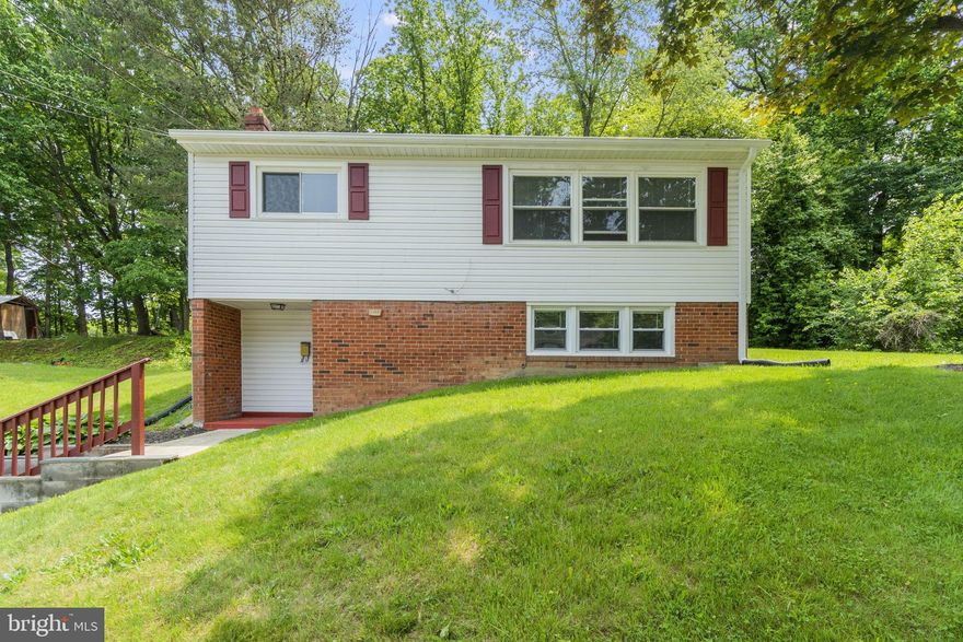 Welcome home to this 3 bedroom, 1.5 bath home that backs to the trees in  a well-established neighborhood.  Updated kitchen includes stainless steel appliances and dining area off the kitchen.  There are 2 bedrooms on the main level and one on the lower level with an additional family space and flex space.    The home is convenient to shopping and for commuting.  The flex space can be used as a office space as well.   New carpet and fresh paint have been added.  The roof was replaced in 2021 and includes a 5 year transferrable warranty and kitchen appliance is 2020.