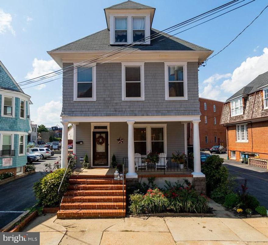 Beautifully renovated and restored 5 bedroom home located in the heart of Annapolis just steps to everything downtown.  This is a rare opportunity to live & work in Annapolis w/OFF STREET PARKING for 3-4 vehicles. Zoned  P  Comm/Res. This home was completely renovated in 2014 to include a gourmet kitchen w/Quartz counter tops, stainless appliances, custom trim & built-in bookcases.  It features a 2nd floor master suite as well as a 3rd floor master with en-suite bath with steam shower and dry sauna, beamed ceiling & huge walk-in closet.  The lower level is a licensed apartment with separate entrance, or it could be used as and in-law suite, au pair apartment, or rec room.