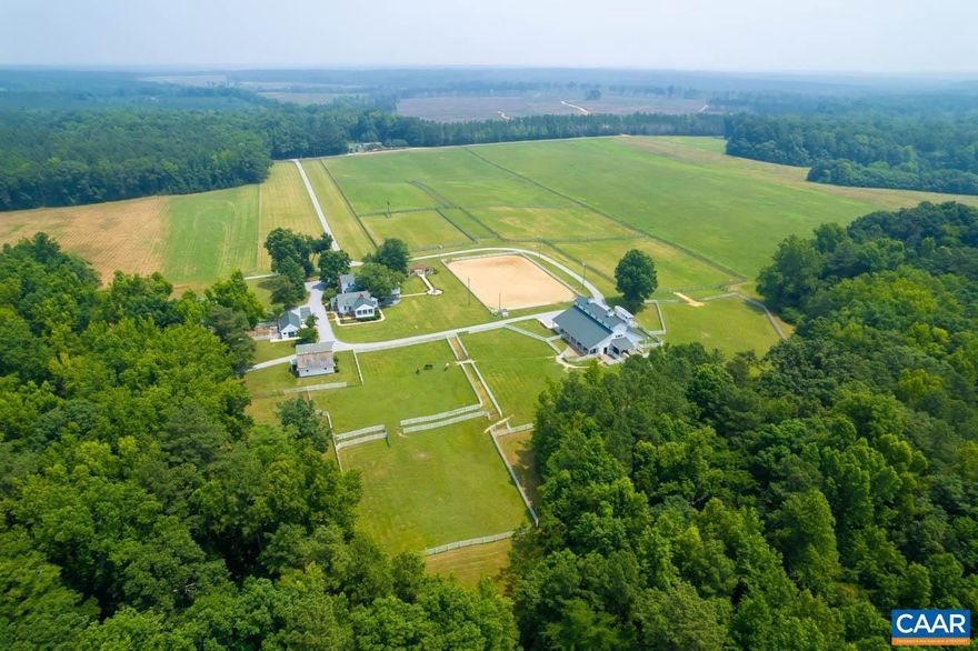 Immerse yourself in luxury at Belle Oakes, a Virginia estate of unmatched elegance. Spanning 138 acres of picturesque landscapes, this prestigious horse farm has been cherished by one family for 25 years. Enter through the gated entrance to the elegant 4 bed/3.5 bath home, blending classic charm with modern living. Equestrian enthusiasts will delight in the custom seven-stall barn, adjacent lighted riding ring, and open fields for training or relaxing trail rides. Luxurious amenities include a gym, storage building, studio/office, and workshop. Lush gardens, a pergola, and a fountain create an enchanting atmosphere for events. With a well, water system, and generator, the property is self-sufficient. Explore horseback riding trails, walkways, and biking paths, while your dogs enjoy their own dedicated fenced area. Experience countryside luxury at Belle Oakes.