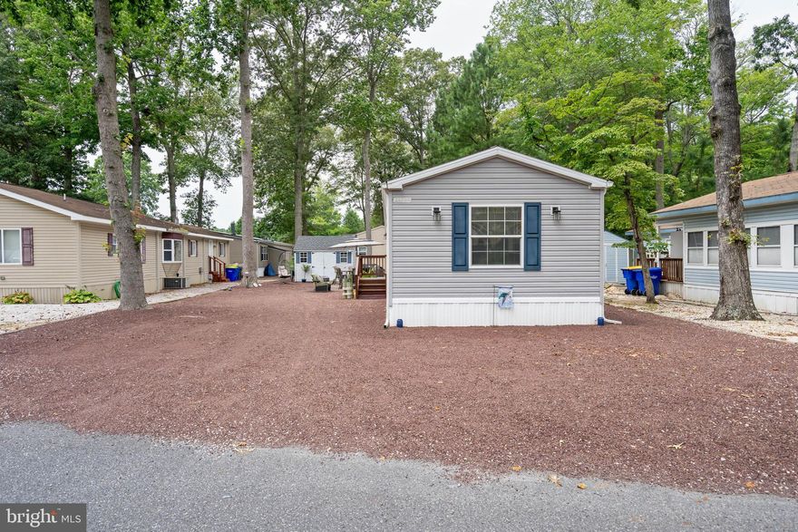 Welcome to 25754 Blue Ridge Street in the desirable Sun Retreat community of Millsboro, Delaware! This charming 3-bedroom, 2-bathroom home offers a well-designed split-bedroom layout that ensures comfort and privacy. As soon as you step inside, you’ll be greeted by a spacious great room that flows seamlessly into the dining area and kitchen, perfect for everyday living and entertaining. The private primary suite is thoughtfully tucked away on the left side of the home, while two guest bedrooms and a full guest bath are located on the right side, providing a comfortable separation between living spaces. Outside, enjoy a large paver patio ideal for relaxing or hosting friends, plus a convenient storage shed for all your tools and toys.

The amenities at Sun Retreat are truly impressive! Residents enjoy a sparkling community pool, a welcoming clubhouse with a meeting room and fitness center, a basketball court, pickleball court, playground, and even a marina with slips available for rent for those who love life on the water.

Located just minutes from all that Long Neck has to offer, including a wide variety of restaurants, three grocery stores, and numerous shops, you’ll have everything you need at your fingertips. This home combines comfort, convenience, and resort-style living in one incredible package.