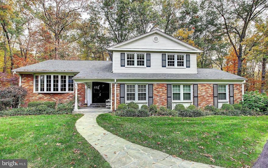 Welcome home to this 5 bedroom 3.5 bath home in Wayside. Walk into a spacious foyer with a few steps up to the light and bright living room with wood floors throughout. The bay window is the perfect place to take in the peaceful view. Easily move into the dining room with wainscoting and enough room to host family gatherings. The spacious kitchen provides plenty of counter space, cabinet space, pot rack above peninsula and a built-in breakfast nook. The laundry room is behind a secret door that looks like a built-in cabinet in the main level half-bath. The family room features a cozy brick wood fireplace. Rounding out the main level is an office with built-in bookshelves on one wall, which is also the fifth bedroom. Retreat to the primary bedroom with walk-in closet, cooling ceiling fan and en-suite with glass shower. Three bedrooms and a hall bath complete the upper level. The finished, walk-out basement provides a kitchenette with under-the-counter refrigerator, and full bath, ideal for in-law suite or rec room. The screened-in deck is perfect for warm weather entertaining and for watching the seasons change. The neighborhood has many advantages you will enjoy including Hunter Mill Swim & Racquet Club, a Cross County Trail that connects to the W&OD Trail and Tamarack Park. Easy access to Dulles Access Road entrance, Dulles Airport, Downtown DC and Wiehle Ave Metro Stop. Enjoy Downtown Vienna and Reston just minutes away by car.