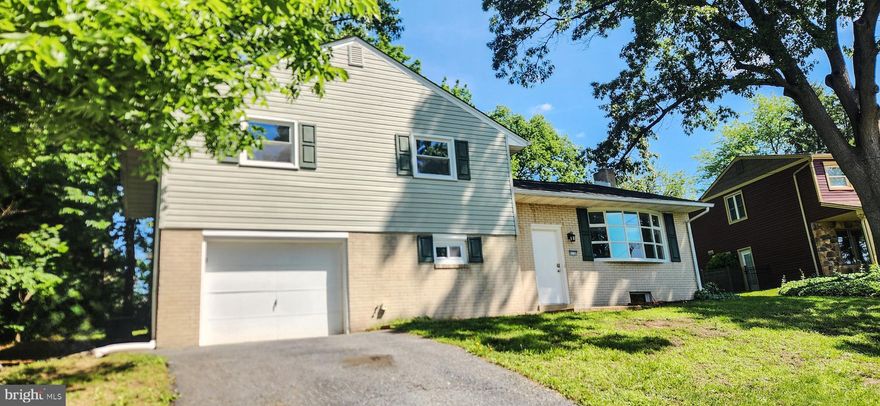 This well-designed split-level home features distinct living areas across multiple levels, providing functional space and comfortable accommodations for everyday living needs. This well-maintained home features three comfortable bedrooms and two full bathrooms, providing ample space for daily living. The thoughtfully designed floor plan maximizes functionality while maintaining a welcoming atmosphere throughout. Beautiful hardwood surfaces add warmth and character to the living spaces, creating an inviting environment that enhances the home's natural charm. These durable surfaces provide both elegance and practicality for everyday use. The property sits on a nicely sized lot in a quiet residential neighborhood, offering privacy and tranquility for homeowners seeking a peaceful retreat from busy daily life. The established location provides convenient access to local amenities while maintaining the serene atmosphere that makes this house a true sanctuary. Schedule your private showing today to experience the thoughtful layout and comfortable living spaces that make this split-level home a perfect place to call home.