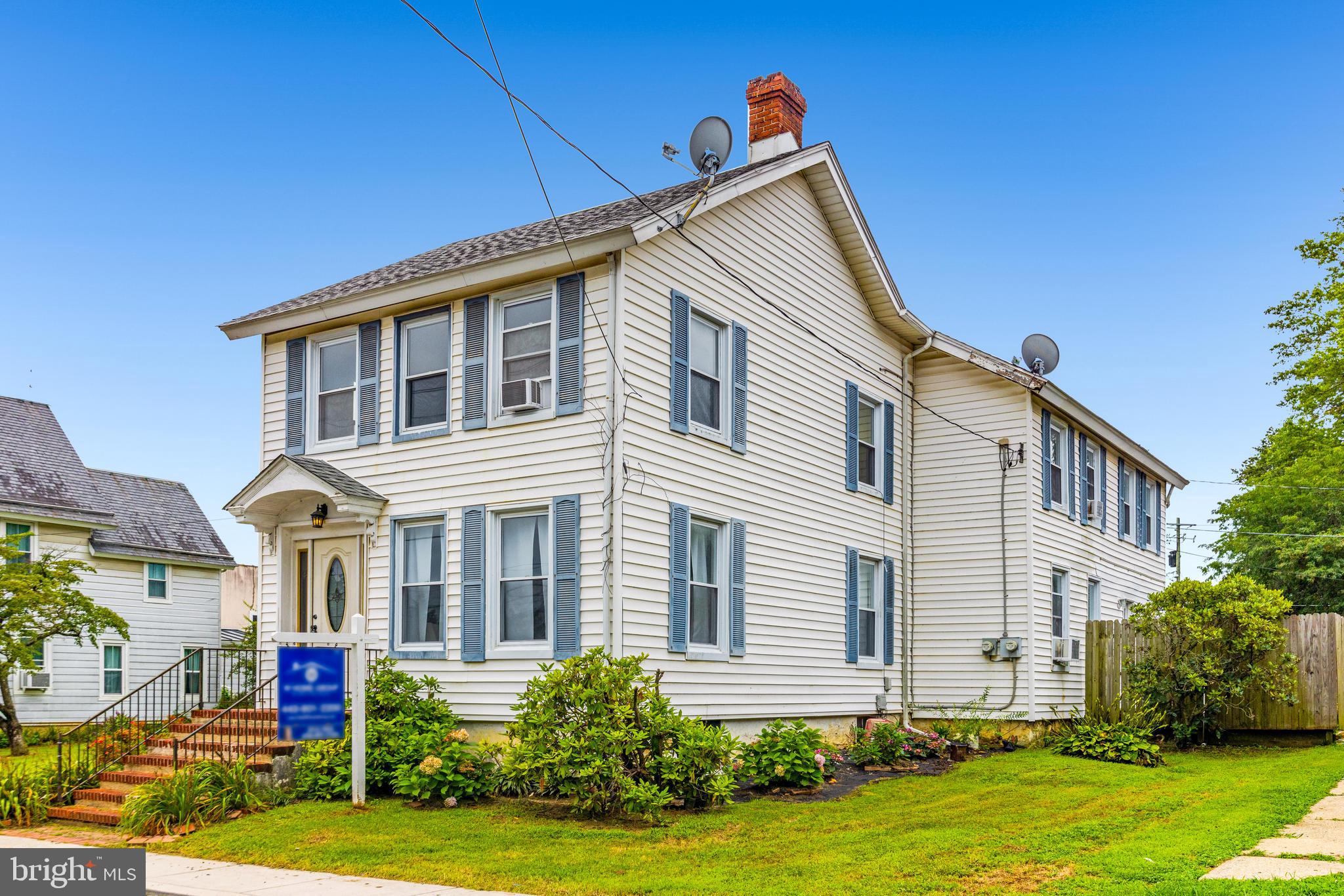 Welcome to 16 N Walnut St in Rising Sun! This spacious home is situated on an oversized lot right in the heart of town. As you step inside, you'll immediately notice the tall ceilings, historic charm, and an abundance of natural light throughout. The main level features 2 large family rooms, a separate dining area, and a spacious kitchen with additional table space, offering easy access to the back patio and landscaped yard. Off the dining room, a versatile sunroom provides plenty of potential, and a half bath adds convenience. Upstairs, you’ll find 3 generously sized bedrooms, 2 full bathrooms, and laundry. The primary bedroom has a huge walk-in closet and a private bath. There’s also access to the finished attic space, ideal for extra storage or a bonus flex area that can be finished to suit your needs. The basement is unfinished and houses the utilities. One of the best features of this property is its walkability to local conveniences. Step outside, and you’re across the street from the post office, just a short walk to the grocery store, Starbucks, Rise and Grind, and Triangle Dog Park and trails. The property includes 2 off-street parking spots, with additional short-term parking available in the lot behind the house. Welcome home!