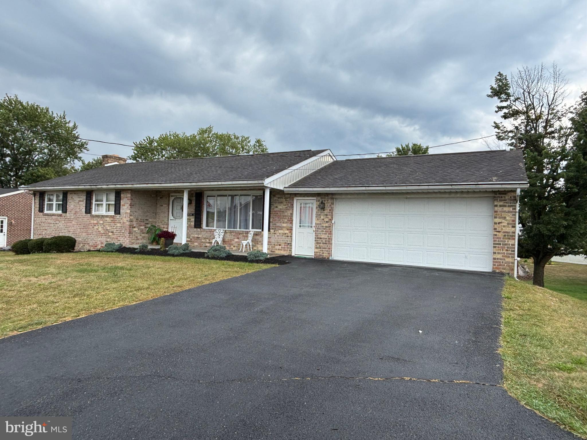 Spacious all brick ranch style home. This well-maintained home features three bedrooms, two full bathrooms and one-half bath. Spacious kitchen open to the dining room which leads out to the covered rear deck. Full walk-out basement featuring finished family room and plenty of storage. Two-car attached garage.