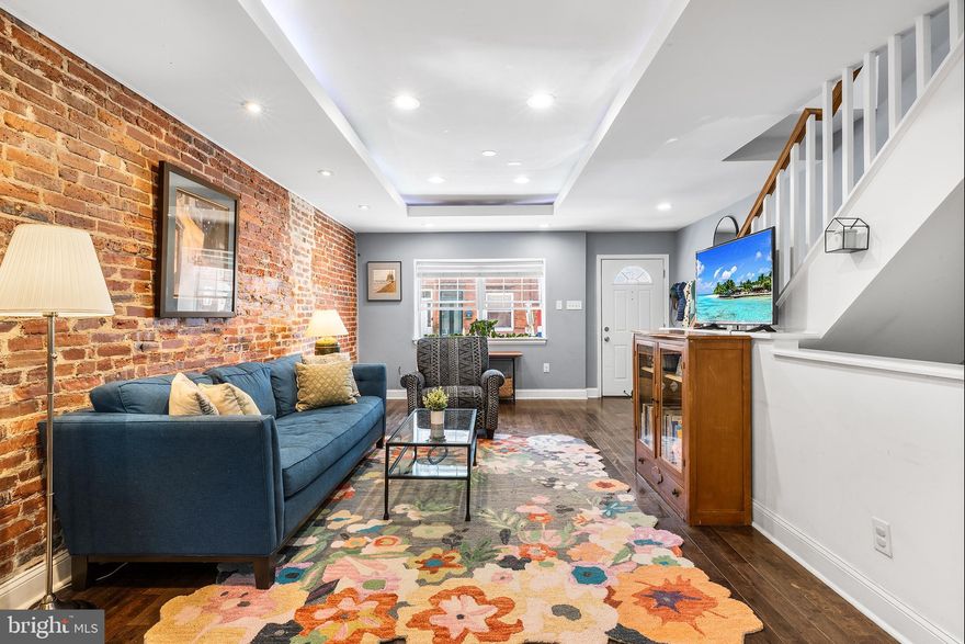 Just a few blocks from Passyunk Ave, 1938 S. 19th Street delivers modern living, generous space, and a true South Philly lifestyle. This fully renovated 3-bedroom, 2.5-bath home blends clean design with everyday comfort in all the right ways.

Step inside and you’re welcomed into a bright, open concept first floor filled with natural light from multiple exposures, highlighting soaring 9-foot ceilings, 16ft wide, warm hardwood floors, and an exposed brick wall that brings just the right amount of character.

 The living room flows effortlessly into a spacious kitchen and dining area featuring ample cabinetry, granite countertops, stainless steel Whirlpool appliances, and plenty of space to host.  Tucked just behind the kitchen is a convenient half bath and laundry area, keeping everyday living simple and functional. Put those grill master skills to use with a convenient off the kitchen back patio.

Upstairs, you’ll find 3 comfortable bedrooms with high ceilings and a well-appointed hall bath, along with a private primary suite featuring its own ensuite bathroom and walk-in closet- creating a true retreat-like feel.

The finished basement goes way beyond “finished”,  think wide open flex space with soaring 12-foot ceilings and durable tile flooring. Whether you’re dreaming of a cozy lounge, home theater, gym, creative studio, or work-from-home setup, this space is ready to adapt to whatever you can imagine.

Enjoy the very best of classic South Philly living right outside your door.  Start your mornings with a coffee and one of the famous hand pies from Little Susie’s, then swing by Rowhouse Grocery- your neighborhood corner café and market-  for locally sourced groceries and prepared foods all in one stop. Big grocery run? ACME and ALDI are just minutes away.

When it’s time to unwind, meet up with friends at South Philly Tap Room or Second District Brewing for a game-day drink, or keep it cozy with dinner at Stina, a neighborhood favorite known for incredible Mediterranean dishes and wood-fired pizza.  Craving mexican? La Llorana  is not to be missed offering authentic cuisine and cocktails.  Stephen Girard Park is just around the corner and the perfect local green space for a walk with the pup or a relaxed neighborhood stroll.   Spend your weekends exploring Passyunk Ave’s shops, restaurants, and energy just steps away.

And with the stadiums, Broad Street Line, and multiple SEPTA stops all just blocks away, getting anywhere in the city couldn’t be easier. 1938 S. 19th Street puts you right in the middle of it all - food, fun, and that unbeatable South Philly lifestyle.

Looking to maximize your purchasing power? This property qualifies for a 100% financing program, meaning no down payment and no monthly PMI.  Reach out for more details!