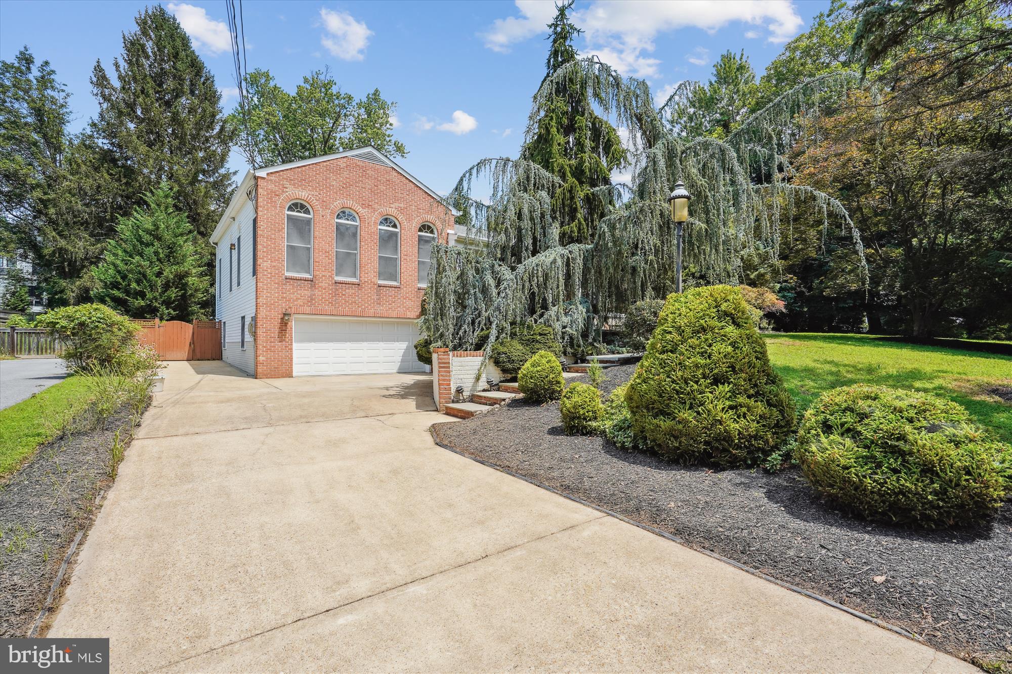 Welcome Home! The Photos don’t lie! You will Love to this contemporary Lakewood Estates home with a two-level addition! A rare find with the owner's ensuite on the main level and an expansive 2-story Great room with floor-to-ceiling windows! Impeccably maintained and renovated, this 6-bedroom, 4 upgraded full baths home offers tons of options for a private home office or guest bedrooms. You will enjoy years cooking in your Gourmet Designer Kitchen with Thermador Professional gas cooktop with grill and griddle features, 2 ovens, eat-in kitchen, stainless steel appliances, and breakfast bar. The Large Sliding glass doors off of the kitchen leads you to a beautiful slate patio, ideal for entertaining.
Proudly host holiday dinners in the lovely formal dining area. A few steps down lead you to the family room with a cozy wood-burning fireplace and a second walk out sliding glass door to the spacious backyard. The Car Enthusiast Will Love the Huge 4 Car Tandem attached garage. Idea for all your needs. There's also a large workshop or the perfect room for a home gym!
Additional Features include a tankless hot water heater. A Two-Zone HVAC and a whole house back-up generator (18,000 watts) have been well maintained with service contracts.
The interior of your new home has been professionally painted.
Hardwood floors throughout, no carpet in this home! Public water, public sewer and No HOA. As we head outside, you will find the perfect size lot, just under a 1/2 acre. Beautifully landscaped front yard with exotic evergreens and bushes.
Large fenced rear yard with an expansive terrace, as well as a private deck off the owner's suite. Many mature trees and shrubs, including roses and azaleas, as well as herb and wildflower gardens, and raised beds for vegetable gardening. You will love the convenient location. 5-minute drive to Lakewood Elementary, Robert Frost MS and Wootton HS. Quick drive to Traders Joes and Falls Grove Village Center with tons of restaurant options. Rockville and Shady Grove Metro Centers are within 4.5 miles and an easy drive to Bethesda or Washington DC. Don’t wait, someone else won’t.