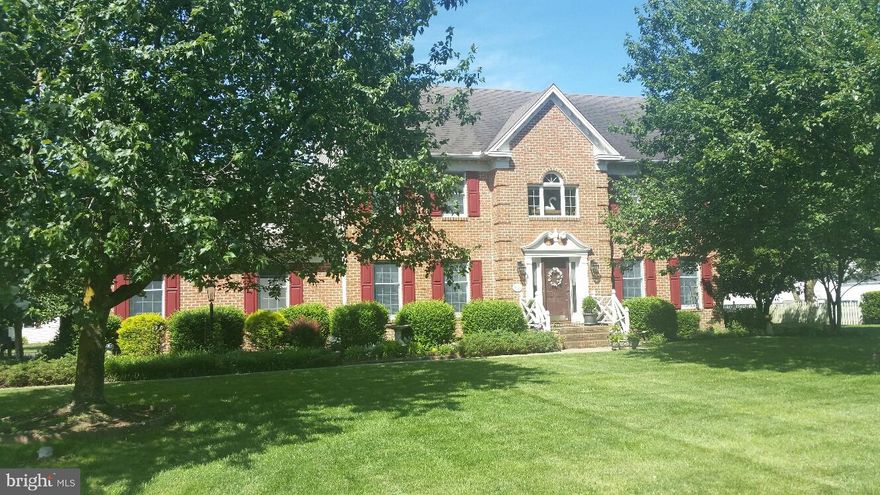 Well cared for inside and out, this delightful 2367 sq ft,  4 bedroom, 2.5 bath residence is just the place to call home. 1st floor features include a spacious great room w/ gas FP, hardwood flooring and deck access, a formal dining room (currently used as a den), an updated kitchen w/ granite, stainless appliances (including a dual fuel range), breakfast bar, dining area and hardwood flooring, and a powder rm w/ tile flooring. The 2nd floor offers a home office w/ access to the walk-up attic, laundry closet w/ W & D, master bedroom w/ private bath and walk-in closet, 3 additional bedrooms and a hall bath. Enjoy the outdoors from the spacious fenced back yard w/ an inviting deck and patio. Other features include a 2 car garage, in ground irrigation and gardener's shed. Septic approved for 6 full time residents.