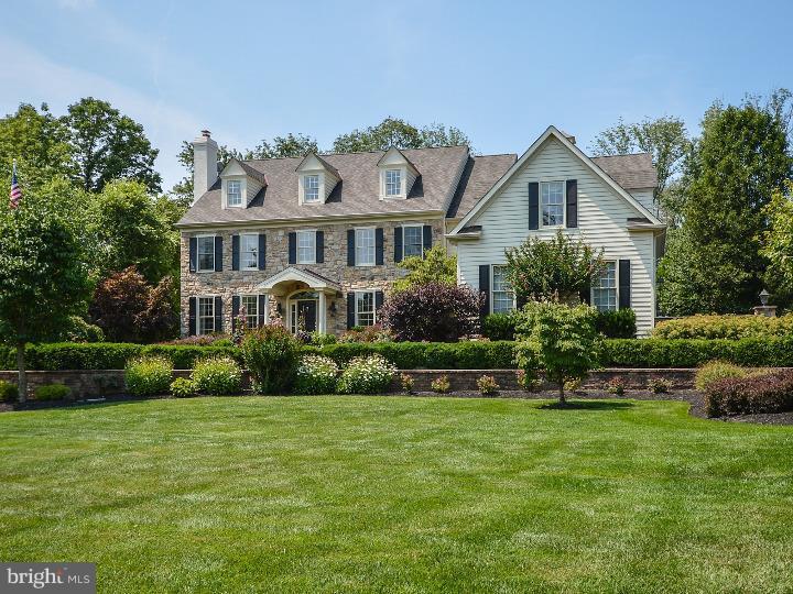 Come see this truly breathtaking, exquisite custom English Manor home. An incredible price for this stately 4 Bedroom,4 1/2 bath home. Every room impeccably maintained within the 6429 sq.ft of living space is a combination of elegance laced with warmth and great charm. You will find over $450k in custom features throughout this signature residence?. The back yard has been transformed into an Oasis with the extensive landscaping, 700 sq. ft. swimming pool with spa and wander down the E.P. Henry walkway leading to the Gazebo for your breakfast coffee or just a place to escape....in almost any season. You are welcomed into this gracious home through an inviting and grand front foyer. Perfectly appointed living room offers a gas fireplace and beautiful muted colors. Gracious and spacious Dining room that lead to the family room and kitchen. The Gourmet Kitchen equipped with totally custom cabinetry, new granite counter tops throughout and new back splash, Newer Wolf cook Top & a Sub Zero Refrigerator. The remaining rooms include Family Room with walled stone fireplace and new wood flooring, spacious Study enhanced with cabinets, Mud Room and Powder Room. You are ushered throughout the 2nd level with gleaming hardwood flooring, wainscoting and a continuation of charm and exquisite appointments. Every Bedroom offers neutral carpeting, custom closet systems & a continuation of tasteful appointments. Main Bedroom, Luxury Bath & Sitting room will be a haven for relaxation and tranquility. Lower Level has been completely finished with gym area, new sauna and relaxation room, wine cellar and wainscoting all throughout from basement to second floor landing. Quality & meticulous craftsmanship continues on the exterior of this home. Complete removal of all stucco and replaced with Hardy Plank throughout making an attractive look. Picturesque & private setting offers beautifully manicured lush landscaping and plantings enhanced by retaining walls, wing walls and post lights and lighted cherry trees lining the driveway! This home is a rare find.