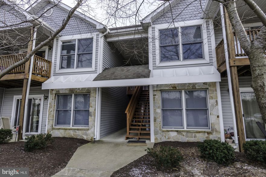 Nice 2nd floor condo with 2 bedrooms, 2 baths, living room with fireplace, dining area off kitchen, balcony overlooking pond with fountain.....Bayside offers clubhouse, exercise room, pool, tennis court and more, walking distance to marina and restaurant.  Owner is in process of putting in SS appliances, new kitchen flooring, new counter top and some new light fixtures.  Also, available for sale.