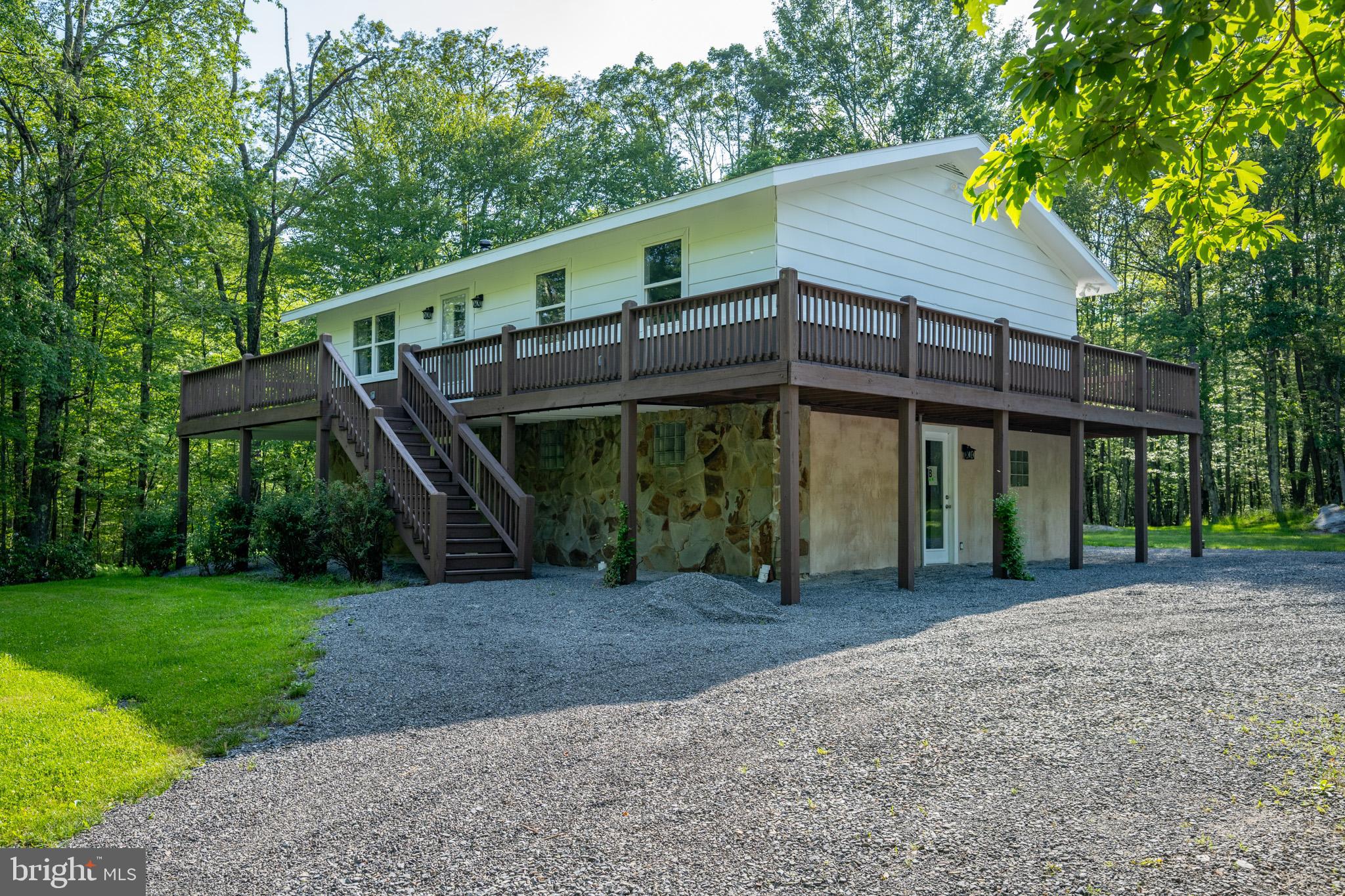 Completely remodeled and ready for your next adventure—this 3-bedroom, 2-bath home in Yough Mountain Resort is the ultimate mountain escape! Nestled in a quiet, secluded area, this beautifully updated retreat offers modern comfort in a rustic setting. Enjoy the convenience of a detached 2-car garage and direct access to over 50 miles of private roads and trails—perfect for ATVs, snowmobiles, hiking, and more. Whether you're looking for a peaceful weekend getaway or a year-round hideaway, this home offers the perfect blend of tranquility and outdoor fun. Don't miss your chance to own a slice of paradise in one of Western Maryland's most popular recreational communities!