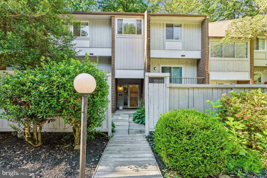 *A Fabulous Mid Century Vibe  Modern  Townhome in sought after Reston Location*Open Floor plan with numerous updates and designer touches throughout * Gourmet Kitchen with  granite countertops and stainless steel appliances *Fireplace in Living Room with custom built in cabinets^ Gleaming Hardwood flooring in Living Room and Dining Room* Large Primary  Bedroom suite including double closets, sitting area and ensuite remodeled bath*Finished lower level  with recreation room,  half bath , laundry room and storage area*Numerous outside spaces  making it just a perfect place to entertain guests. Enjoy sunny afternoons and cool evenings in your private front  courtyard with stone patio, kitchen balcony or backyard brick patio backing to lush trees. This picture perfect townhome is in a dream location just minutes away from Reston METRO STOPS,  Reston Town Center,  shopping, restaurants, schools, and parks.  * Driveway parking plus additional assigned spot* Cul-de-Sac location with tot lot* A MUST SEE HOME* Additional Reston Association Fee of $718 annually