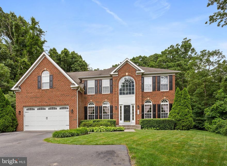 This move-in ready colonial offers plenty of privacy as it sits on half an acre and backs to forest conservation so your private wooded oasis will never be disturbed. This Cattail Passage home has had one owner and is impeccably well-maintained. It features 6000 square feet of living space with 5 bedrooms and 4.5 baths. Features in this home include: a two-story foyer, open floor plan, hardwood floors, granite countertops, a center island with breakfast bar, walk-in pantry, 42” cabinetry, gas fireplace, double vanities, a fully finished basement with game room, and more! Severna Park Schools and the B&A Trail are just steps away at the entrance to the community. Enjoy biking or walking to local restaurants, Kinder Farm, and other shopping!