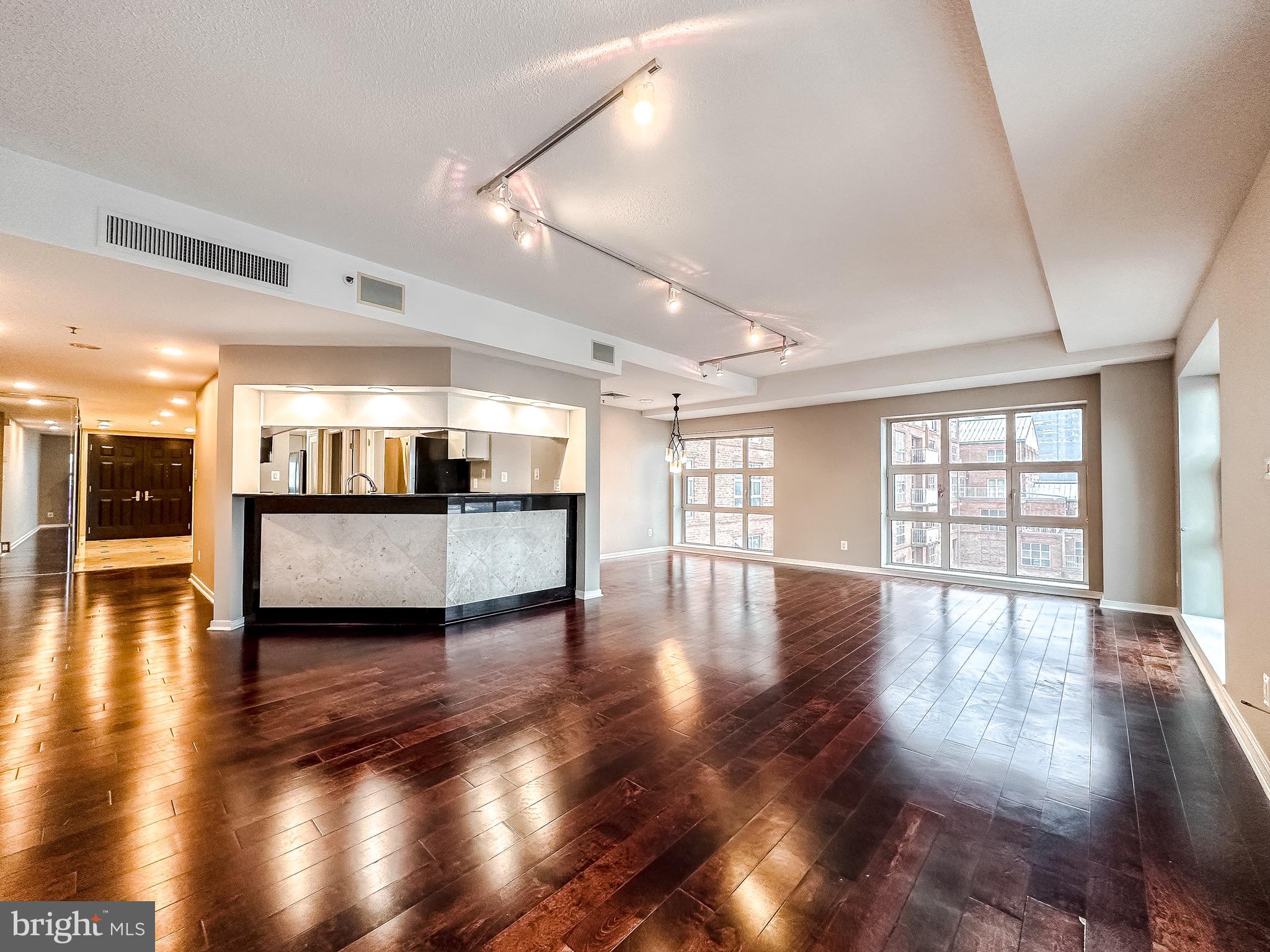 Welcome to this stunning two-bedroom, two-bathroom condo in the sought-after Scarlett Place Condominiums, offering gorgeous water views, beautiful flooring throughout. and a new hot water heater. Enjoy an array of premium building amenities, including a 24/7 front desk, deeded parking space, assigned storage unit, state-of-the-art fitness center, indoor pool, and a welcoming community room—perfect for entertaining or relaxing.