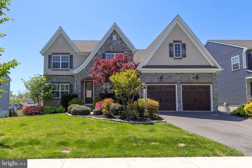 This beautiful Keystone-built home offers an opportunity to own a property designed with the exact upgrades and finishes of the model home for the community.   From the elegant stone exterior to the thoughtful layout, every inch of this residence reflects quality and attention to detail.
The heart of the home features an open floor plan with wide-plank engineered flooring throughout. The kitchen is a standout, anchored by a massive island that overlooks the living area.  It is complemented by quartz countertops and stainless steel appliances.
For ultimate convenience, the primary suite is located on the main level. This private retreat includes a spa-inspired bathroom with a walk-in shower and two spacious walk-in closets.
On the upper level, you’ll find four additional bedrooms and a versatile loft, perfect for a secondary lounge or study space.  One of these bedrooms includes a private bath.  Every bedroom in the house is equipped with custom California Closets.
The living space extends outdoors to a covered porch featuring a two-sided gas fireplace, creating a cozy atmosphere for any season. The walk-out lower level is fully prepared for hosting, complete with a wet bar, a massive recreation room,  and direct access to the patio and backyard.
This home offers the perfect balance of high-end features and a functional layout for modern living.   More photos will be added next week.