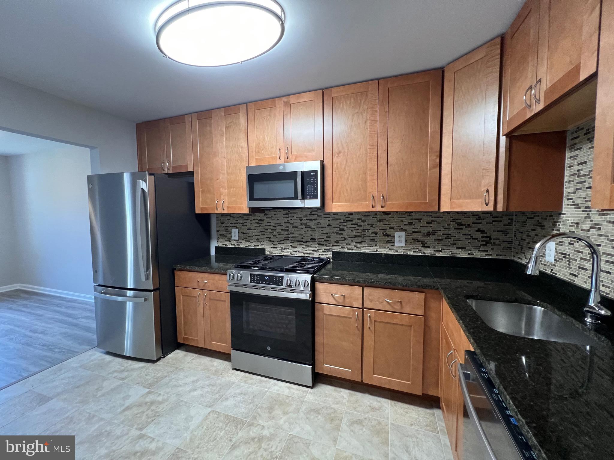 Newly built 2025 1-bedroom PENTHOUSE condo located near the Kentland's, AstraZeneca, NIST, and so much more! This gorgeous home showcases LVP flooring, an upgraded kitchen with stainless appliances, gas cooking, granite countertops, a designer backsplash, and custom wood cabinetry.
The spacious living room has access to a sunny balcony, and the separate dining room is ideal for entertaining guests. The layout is thoughtfully designed and just waiting for your creative furnishing ideas. The primary bedroom features a walk-in closet, and the bathroom is complete with a tub/shower combo, ceramic tile floors/walls, and ample storage. 2 walk-in closets, a linen closet, and an extra storage room make this a dream space to grow into. Utilities and assigned parking included in rent!
Enjoy beautiful parks, nearby public transportation, access to ICC, l270, excellent dining options, Kentland's Rio, Downtown Crown, and a community pool.
