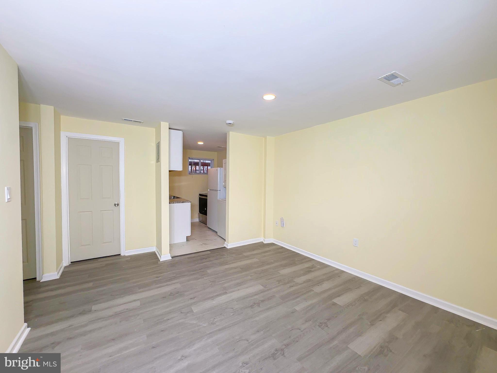 Discover comfort and convenience in this 2-bedroom, 1-bath unit attached to an owner-occupied home in a quiet, well-kept neighborhood. The unit has a separate entrance with a private walkway and includes essential appliances such as a refrigerator, washer, and dryer—making move-in easy. There is ample street parking directly in front of the house. Located just minutes from shopping, dining, and daily essentials, this home offers both privacy and accessibility in a peaceful residential setting. The landlord pays for water, electric, gas, trash, and internet.
