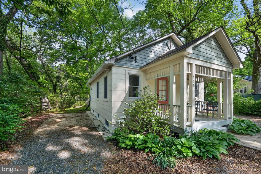 Charming, fully updated cottage in sought-after Capitol View Park offering the perfect blend of privacy, convenience, and value. Tucked into a lush, oversized 15,000+ sq ft lot, this 2BR + den/sunroom home lives larger than expected with bright, open spaces and seamless indoor-outdoor flow.

The renovated kitchen features high-end stainless steel appliances, custom sink and fixtures, and thoughtful finishes throughout. The updated bath showcases Italian tile and quality upgrades.  Hardwood floors, abundant natural light, and a welcoming front porch add to the home’s character and comfort.

Set back in a serene, wooded setting with ample parking for 4–6 cars, yet just minutes to Forest Glen Metro, I-495, Bethesda, downtown Silver Spring, and Rock Creek Park. MARC train and bus access nearby make commuting effortless.

A rare opportunity to own a move-in ready home with land, privacy, and accessibility at a compelling price point.