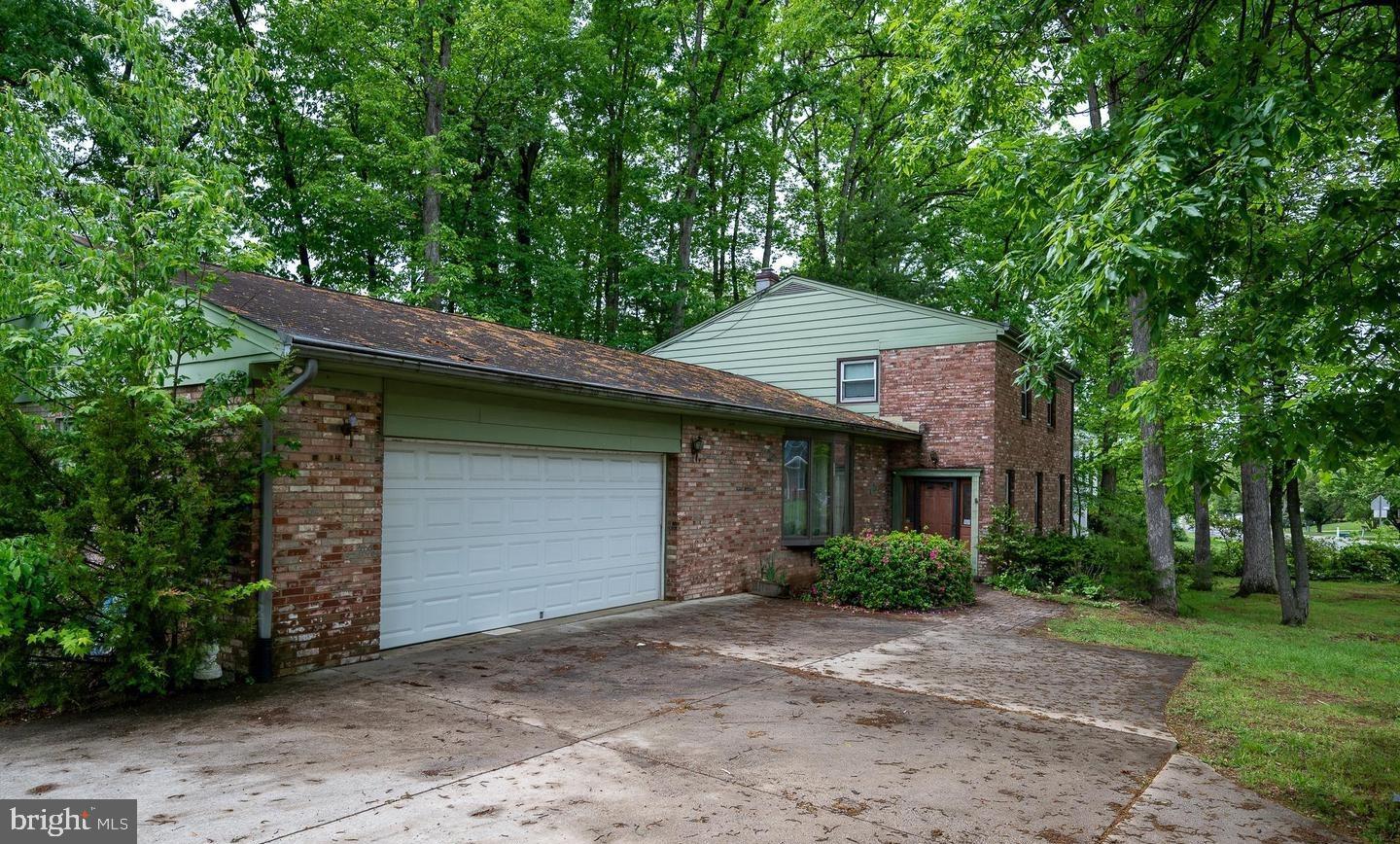 LOCATION, POTENTIAL, AND PRIME OPPORTUNITY! Welcome to 402 Old Courthouse Rd NE in Vienna, VA — a rarely available 0.31-acre lot located in the highly desirable West Briar Country Club Hills neighborhood. This spacious 5-bedroom, 2.5-bathroom home is undergoing extensive remodeling and renovation. This includes new and modified layout, new kitchen, additional windows, new deck, new doors and hardware, flooring, paint.... The property backs directly to Westwood Country Club, providing a private and peaceful setting surrounded by mature trees and established homes. Situated in an unbeatable location, you're less than one mile from Tysons Corner, just a five-minute drive to Vienna’s vibrant Town Center, and close to major commuter routes, Metro access, and top-rated Fairfax County schools. This is an exceptional opportunity for those looking to enjoy one of the Northern Virginia’s most sought-after communities.