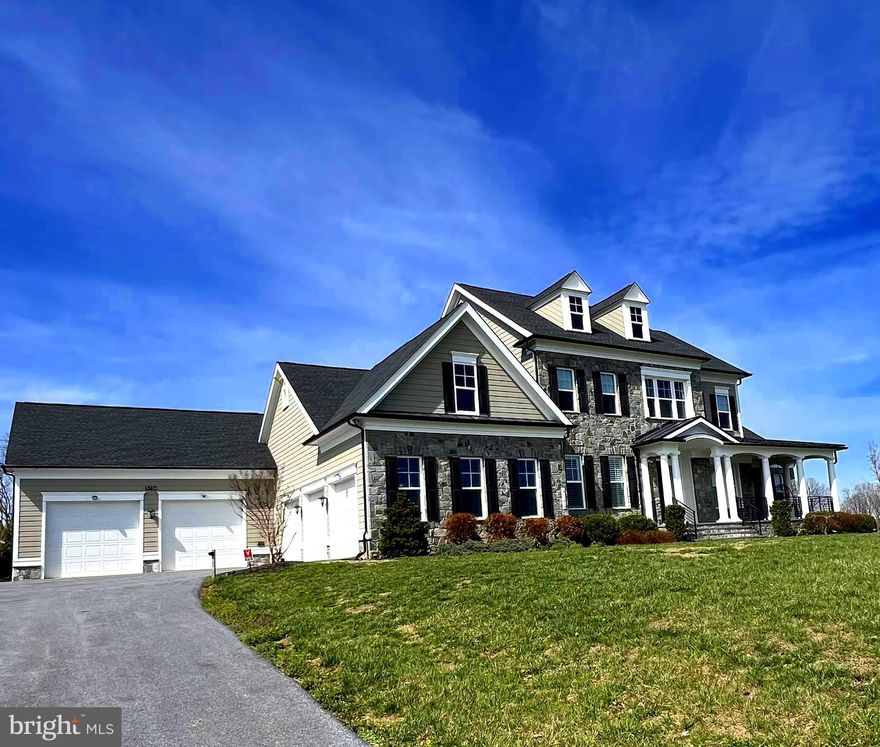 This 6 year young Mitchell & Best custom home is situated on 7.6 serene acres with spectacular views of Sugarloaf Mountain. Upgrades and amenities abound on this home. Starting on the outside with Hardiplank siding and real stone foundation, moving inside the kitchen comes complete with a Viking oven with commercial venting, double wall oven and 2 pantries. The family room offers a wood burning fireplace with stone surround, built in shelving and coffered ceilings. 1st floor primary suite boasts a steam shower, separate vanities and separate closets. 1st floor laundry "suite" features a wash tub and a refrigerator. The screen porch/sunroom with gas fireplace is a perfect place to start your day with a cup of coffee. Step out back to the relaxing pool/spa and enjoy entertaining at the outdoor kitchen/gazebo. Upstairs you will find 3 spacious bedrooms, one with an en suite bathrooom  a "Jack & Jill" bath connects the other two bedrooms. Also included on the second floor is a large flex room, (TV, Office, Home gym, etc...) 5 car attached garage comes with a dog wash, propane heat and 12 ft. ceilings to support a possible lift for the car enthusiasts!! Last but not least is the 36X28 separate barn.  Do not miss out on this true gem of a home!!