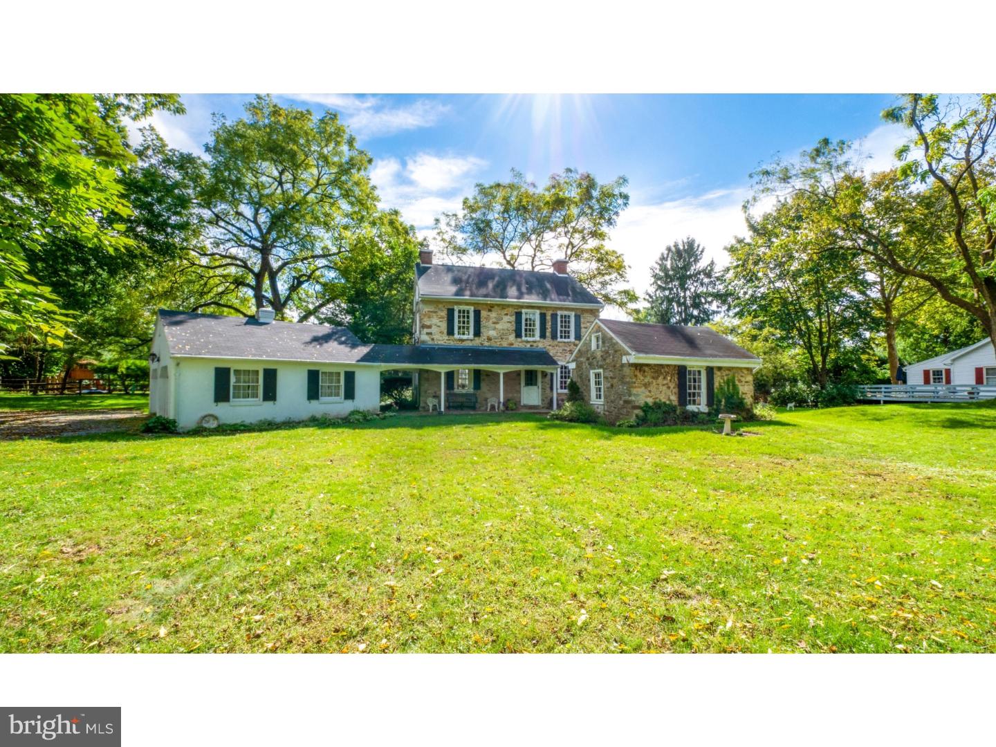 This 1830's stone farmhouse was the original dwelling predating the development of the Meadowbrook area in Salisbury township. The home which is set on an attractive open lot dotted with old walnut trees retains features typical of the nineteenth century: original wide pine plank flooring, deep-silled 9-over-6 hand blown glass windows and open-beamed ceilings. The main living level includes living room with fireplace, formal dining room and kitchen. On the upper level of the house are three bedrooms including a graciously-sized master bedroom and full bath. This property includes a second stone structure, the original summer kitchen, which has renovation potential to multipurpose use. Additionally, you will appreciate the detached two-car garage with covered walkway to entrance of house. This farmhouse was lovingly restored in the 1960's and is ready for the next generation of upgrades. Located within minutes of I-78 providing easy access to NJ & NY.