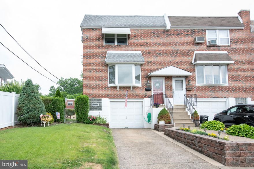 Rare opportunity to own an Amazing End Unit 3-Story Townhome. Yes, 3-stories, because all levels of this home are above ground. This beautiful home is located in the Far NE section of Philadelphia. The curb appeal is absolutely stunning with a front entry garage and driveway parking. As you enter the very large Living Room with a Bow window you will immediately envision having all of your family gathering in this home.  Continue on into the Dining Room that is opened up to the Kitchen, with a Kitchen Bar with extra seating for all of your social engagements. The open flow to the main level makes your home feel very inviting. Upstairs you have 3 spacious bedrooms and a 4-piece center hall bathroom that has been updated. On the lower level of your home you have an oversized Family Room with a Powder Room, and a Laundry Room. You can access your garage from this level for easy access to your car during those rainy or snowy seasons. Exit the back door to your very own Oasis with a fully fenced-in backyard. Sit under your covered patio enjoying all seasons and take in the serenity and privacy of your huge backyard. There is a large storage shed for all of your toys, or projects to come.  This is a one-of-a-kind home that has been extremely well maintained. There is nothing to do but move right in and start enjoying your new Home. All Showings start at the Saturday Open House!