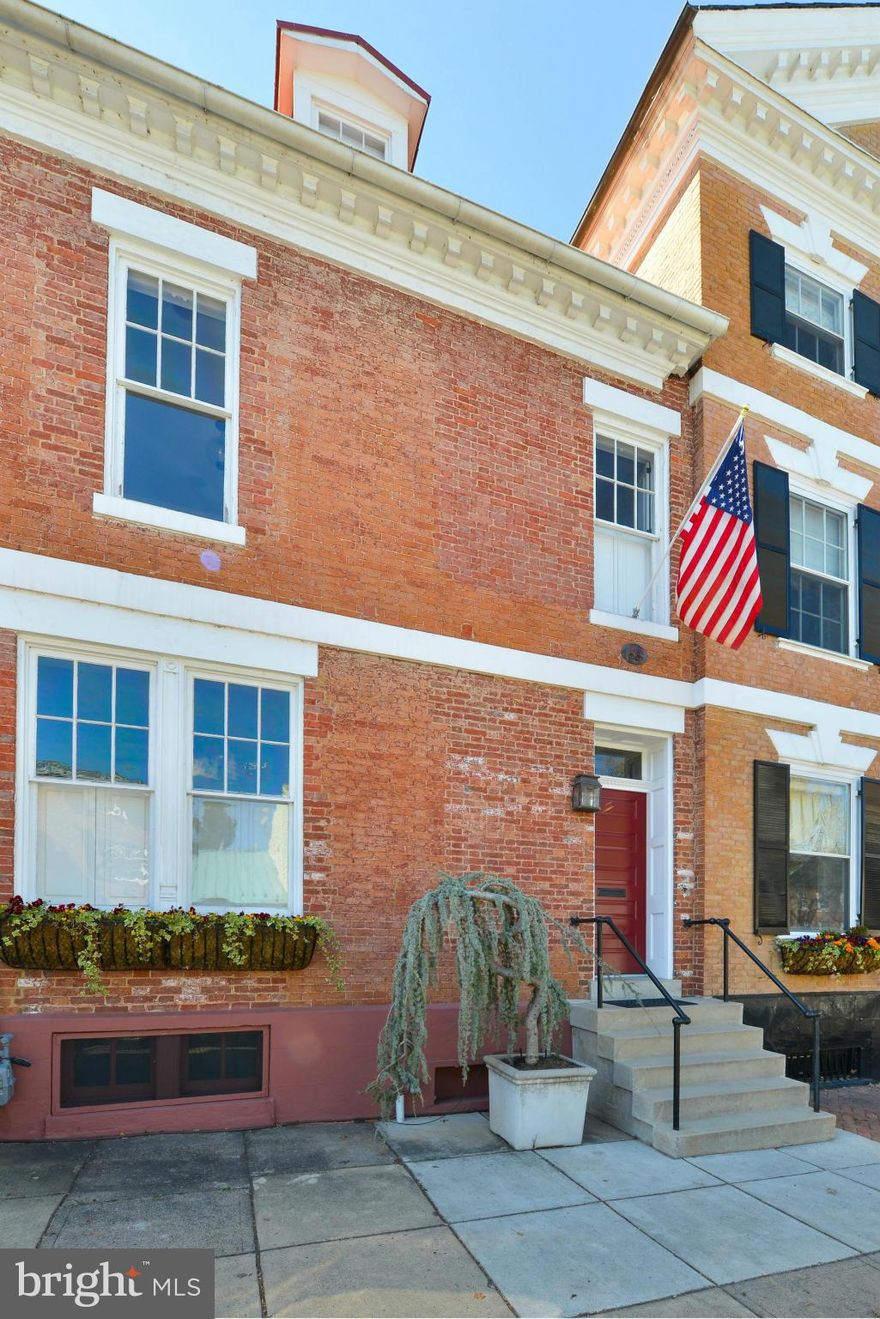 Elegant c.1800 Victorian filled with charm, but with updates for today's living.  Presented in pristine condition with tall ceilings, gleaming hardwood floors and exquisite original millwork. 4 generous bedrooms, 3.5 renovated bathrooms, 2 gas burning fireplaces, gourmet kitchen with family room leading to a lovely landscaped deep walled garden.  One-year leased garage parking included.