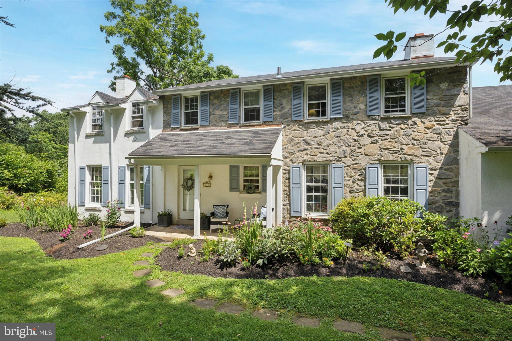 Welcome home to 641 Andover Road, a 5 bedroom 5 bathroom (3 full, 2 half) home situated on 3+ acres of land in walking distance to Aronimink Country Club, home of the 2026 PGA Championship! This stone front colonial has an abundance of living and entertaining space on the 1st floor. Enter into a gracious foyer with marble flooring which leads, on your left, to a living room with a wood burning fireplace and exterior access to your private backyard. Down the hall you will find a powder room and a cozy den with original wood beams, wide plank hardwoods, and a beautiful wood burning stone hearth flanked by built-in book shelves. From the den enter the heart of the home, a bright kitchen with beautiful granite countertops, an oversized island, and an abundance of storage. You have your choice of dining areas, with a breakfast room for your everyday needs as well as a formal dining room perfect for holidays, entertaining, or large family dinners. Access the deck and patio from the breakfast room, kitchen, dining room, or living room. Rounding out the first floor is a laundry room with access to the 2 car attached garage. Upstairs you will find 5 generous sized bedrooms, including 2 bedrooms with ensuite bathrooms, as well as a 3rd full bathroom in the hallway. Original hardwood flooring is preserved underneath the carpet. Don’t forget the basement which includes a large finished space, ample storage in the unfinished area, a half bathroom, and walkout access to the yard. Additional features include updated HVAC, fresh paint, a cedar closet, a pull down attic, a large driveway, and a basketball/tennis court waiting for your personalized touch. The possibilities are endless with this property - update and expand the existing footprint or build your dream home. The location is not to be missed, just ½ mile from Aronimink Country Club, 1 mile from Episcopal Academy, and 2.5 miles from Ellis Preserve. Enjoy the tranquility of the neighborhood while also having convenient access to the Main Line and major roadways including 252, 476, and West Chester Pike. Don’t delay, schedule your showing today!
