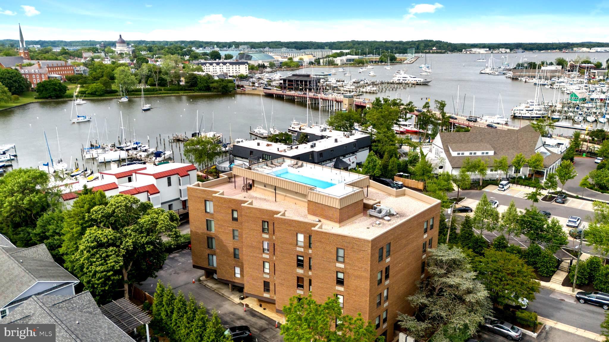 Price improvement! Live in the heart of desirable Eastport, as this inviting condo offers the best of Annapolis nautical living. 316 Burnside Street #304 , is just a short stroll from the serene waters of Spa Creek! This home offers an ideal retreat for those seeking both tranquility in the city of Annapolis! Updated kitchen offers rich cherry cabinetry, gleaming granite countertops, and stainless steel appliances. The kitchen is both functional and stylish. Modern, nautical ash and cherry wood floors flow seamlessly throughout, adding warmth and style to this comfortable space. Recent upgrades includes all new HVAC 2022 of 2 units, freshly painted, and recessed lighting. There is a tankless water heater inside of the unit. The Burnside Condominiums offers a unique blend of urban living and waterfront charm, featuring a rooftop pool and deck with panoramic views of Spa Creek, downtown Annapolis, and the U.S. Naval Academy. These amenities provide residents with a serene retreat to enjoy sunsets, watch events like the Blue Angels' flyovers, NAVY commissioning week, and parade of lights. Partake in kayaking, and paddle boarding with private dock space. and water taxis. Deep water boat slips available for a rental fee. Entertain your friends and watch the Annapolis fireworks from your deck without fighting the crowds. The Burnside Condominiums in Annapolis offers a unique blend of urban living and waterfront charm, featuring a rooftop pool and deck with panoramic views of Spa Creek, downtown Annapolis, and the U.S. Naval Academy. Take an easy stroll to some of the best waterside restaurants, yacht clubs, shopping, grocery store, and all the charm Annapolis has to offer! This is a secured building, with keyed entry, intercom system, and elevator access. There is laundry use on all condo levels and main floor storage unit for your condo space. Off street parking for residents on lot, and guest parking available. This a beautiful home and you will not want to miss a viewing! Move right in and enjoy Annapolis living at its best!