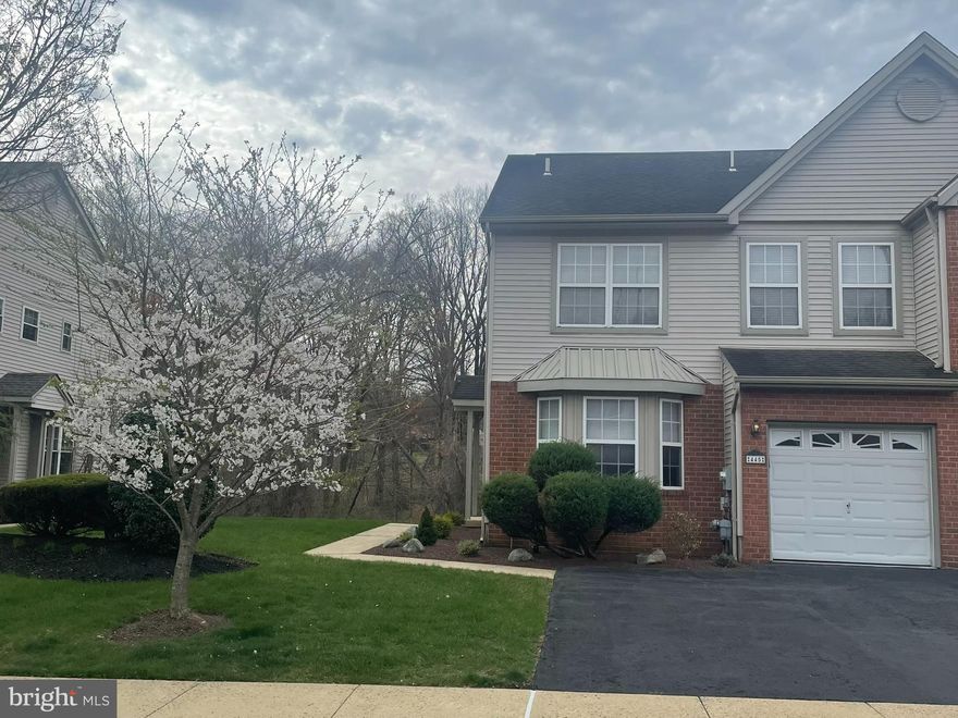 One of the most desired units in the highly sought out Clusters. Immaculately maintained spacious end unit with a finished walk out basement, kept in pristine condition. Loaded with options. Beautiful private wood setting backyard including large back and side yard w/ a spectacular view. Professional landscaping provides stunning curb appeal. Convenient 2nd floor laundry area. Fully finished basement w/ brand new carpet, plenty of storage and walkout sliding glass door to patio. Cable hookup and hard wired smoke detectors in every room. Hunter Douglas silhouette window treatments. Double driveway. Garage door opener. Gas fireplace. Sliding Glass Door to large weatherproofed deck. Giant main bedroom suite w/ large sitting area, cathedral ceiling and double doors. Main bathroom whirlpool tub. Huge custom designed walk-in closet in main bedroom. Gorgeous built-in breakfront in dining room and armoire in bedroom.  Eat-in kitchen.  Newer hot water heater and Newer A/C and heater w/ central humidifier system. Recessed lights, dimmers and surround sound throughout house. A must see!!! Won't last long!!!