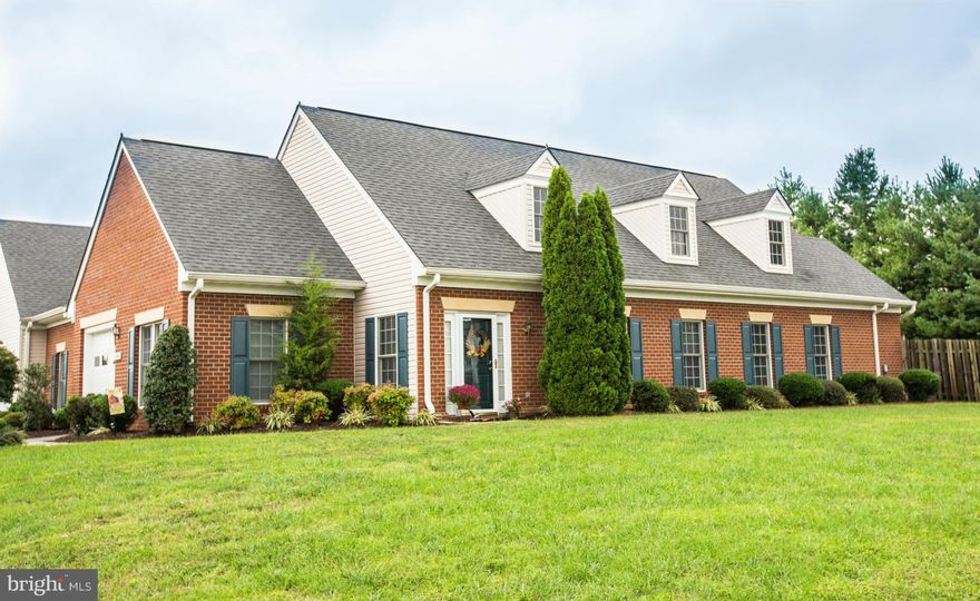 The living is easy in this immaculate, one-level brick villa in Salem Fields. The floor plan encompasses 2 spacious bedrooms w/plenty of storage space, and the master bathroom is the perfect spot for a soak in the large garden tub w/separate shower.Cozy up in front of the gas fireplace. This home is ideally positioned to walk to the grocery store, pool and clubhouse, tot lots and walking trails.