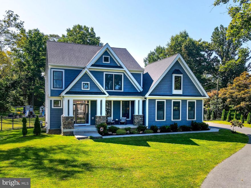 This spacious and light filled craftsman style home is fantastic.  It boasts 5 bedrooms and 4.5 baths and is perfectly sited on a flat lot with fenced back yard ready to enjoy.  The open plan has 9' ceilings and gleaming hardwoods that are perfect for entertaining and flexible spaces for all. The gourmet kitchen includes a large island, stainless appliances and granite countertops along with a nice pantry.  Up stairs, there is a lux primary owners suite with owners bath with walk in shower and double sink.  The spacious walk in also includes a safe. There is an upstairs laundry, another En Suite Bedroom and two other bedrooms and full bath.  The lower level is fully finished and boasts a bedroom, full bath, finshed lowere leve and exercise room.  This is the one that you dont want to miss.