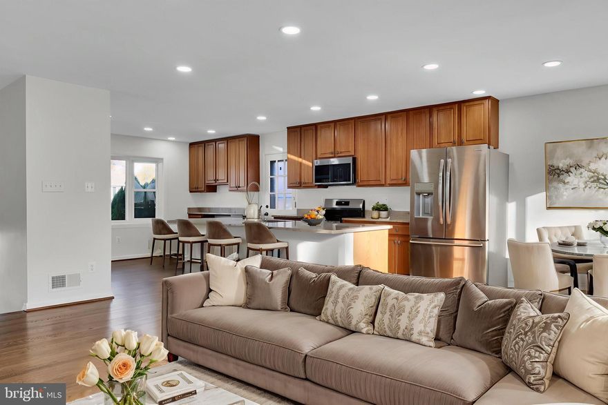 Beautifully renovated and thoughtfully designed, this 4-bedroom, 3-bathroom home is truly a must-see. Step inside to an open and airy layout featuring gleaming hardwood floors, a cozy wood-burning fireplace, and an updated eat-in kitchen that anchors the main level. The kitchen is equipped with brand-new stainless-steel appliances, new granite countertops, generous cabinet space, built-ins, and a functional center island—ideal for everyday living and entertaining.

The fully finished basement offers a dedicated laundry room, an additional spacious family room, perfect for movie nights, a home office, or extra lounging space. The primary bedroom includes its own ensuite bathroom along with two closets for added convenience.

Both the front and backyard are expansive, providing plenty of outdoor space along with a storage shed. The private driveway comfortably fits 2–3 cars.

Nestled in a prime location near major commuter routes—I-495, 295, Metro access, shops, and restaurants—this home offers comfort, convenience, and modern upgrades throughout.