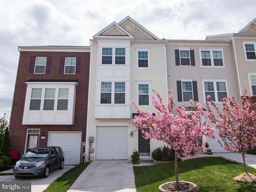 Welcome Home to 58 Corporate, this spacious townhome in located in the sought after Riverside Villages. neighborhood. The main level invites you in with a welcoming foyer with a finished recreation room with a new full bath.  Main level walks out to fenced back yard for entertaining.  Upstairs features the family room, large eat in kitchen and island, a half bath and a TON of natural light. Generously sized master with ensuite and walk-in closet. Located conveniently near commuter routes, restaurants, shopping..this one wont last long!