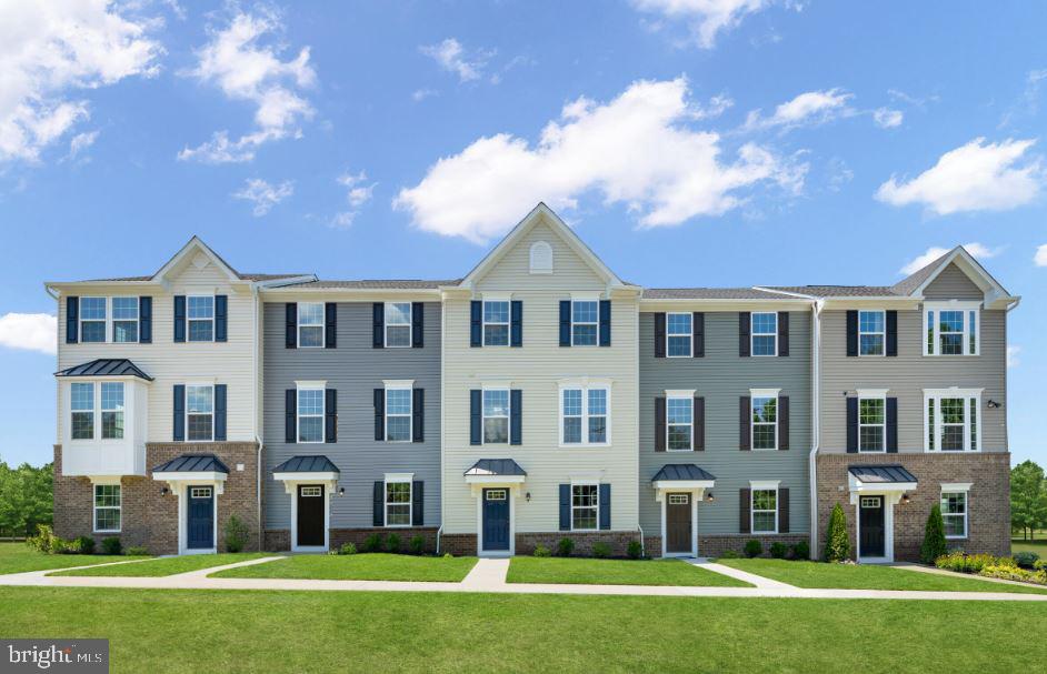 Quick Move in - May Delivery- Up to $20,000 in closing assistance with the use of the seller's preferred lender. STRAUSS E--- BELLE AIR TOWNHOMES---The largest of Ryan’s Composer Series, the Strauss offers the space and customizing details of single-family living with the convenience of a townhome. On the main living level, you’re greeted by an enormous Living Room with a convenient powder room. There is a generous and airy Country Kitchen with an expansive island, perfect for entertaining. A window-lined Morning Room off the Kitchen provides room for dining and is accented with an optional hutch. Up a flight of stairs designed to be elegant and functional, the upper level boasts three bedrooms, two baths, and a 2nd-floor laundry. No need to worry about storage space – generous closets abound in all bedrooms. The Owner’s Bedroom is a private retreat accented with a tray ceiling and featuring an enormous walk-in closet. The Owner’s Bath boasts a soaking tub and a separate shower with a seat. Down the stairs you are greeted with a finished recreation room and powder room.
Photos are representative.