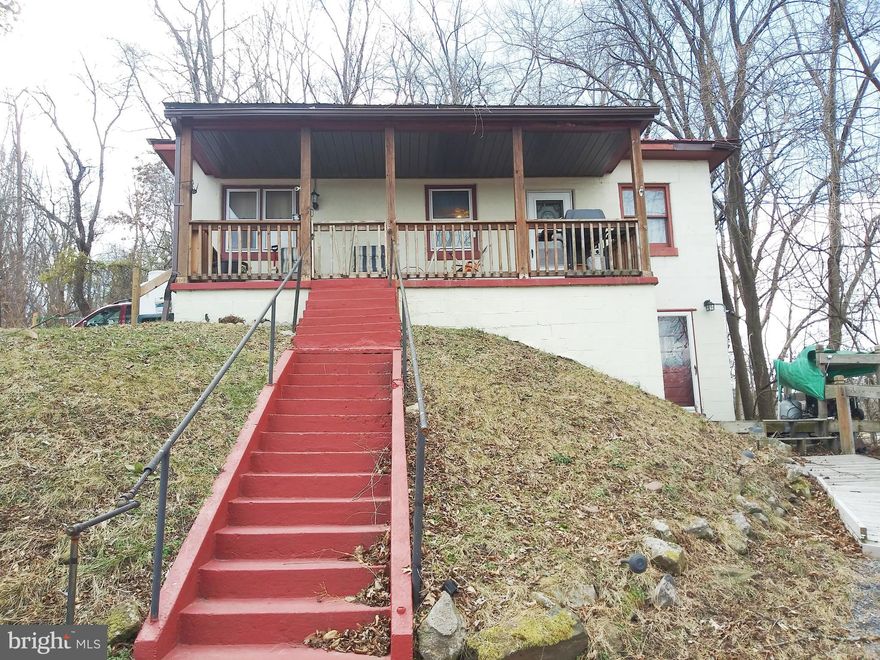 Cozy 2 Bedroom  Home  Featuring  Private Setting with incredible views and still close proximity to downtown Cumberland and I68. Generator back up. Parking for at least 4 cars.