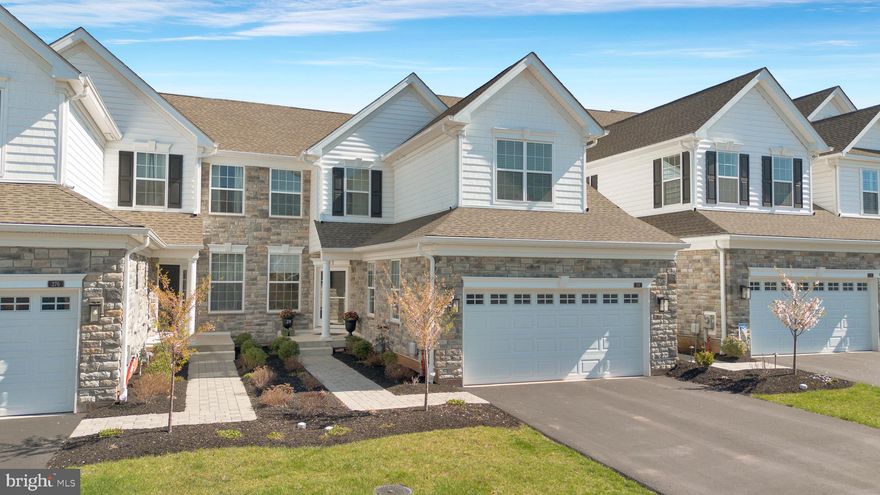 Impressive White Springs at Providence carriage home on the Regency side (55+) of the community.  This immaculate home is one of the newer units built in 2022.  Off of the Entrance Hall enter the Dining Room with hardwood floors, Powder Room with pedestal sink, Laundry Room with ceramic tile floor and access to the 2-car Garage.  The main floor also includes the gourmet Kitchen with quartz countertops and Island, under counter lighting, garbage disposal, microwave, self-cleaning oven, gas cooktop, tile backsplash, recessed lighting, pantry, Family Room with cathedral ceiling and ceiling fan, gas fireplace and an outside exit to a 16' x 16' maintenance free Deck with privacy panel, gate and steps.  Finishing off the main floor is the very spacious  Master Bedroom with tray ceiling, ceiling fan, recessed lighing, 2 walk-in closets with designer closet organizers, Master Bath with double vanity and stall shower.  The 2nd floor features a Loft with hardwood floors, Bedroom #2 with cathedral ceiling, ceiling fan and walk-in closet, Bedroom #3 with walk-in closet and attic access, Hall Bath with double vanity and tub/shower.  There is a full unfinished Basement with battery backup sump pump and egress window.  This gorgeous home also includes an interior sprinkler system, wall-to-wall carpeting in all bedrooms, beautiful window treatment, washer, dryer, refrigerator and a very convenient location.  Walk to Wegmans and the Providence Town Center shopping center.  Enjoy the amenities of the beautiful Clubhouse with meeting room, fitness center and game room, swim in the outdoor pool and enjoy tennis, pickle ball and bocci on the outdoor courts.  This is a must see home!