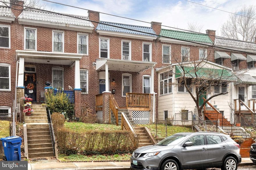Welcome to 2258 Druid Park Drive! A completely renovated home  in the heart of historic Woodberry—where thoughtful modern design meets classic Baltimore charm. This home has been rebuilt from the inside out, with major improvements including all-new electrical, plumbing, HVAC, hot water heater, framing, and insulation. Along with a new roof (2024), a rear addition, and a fully finished basement! On the exterior, the covered front porch provides the perfect place to relax and enjoy the quiet, serene neighborhood surroundings before stepping inside to a warm, stylish, and open interior. This home has been freshly painted, has modern flooring throughout, and an abundance of natural light which creates a bright and welcoming atmosphere from the moment you enter. The kitchen is truly the heart of the home, featuring gorgeous granite counter-tops, a massive center island, stainless steel appliances, accent lighting, and a coffee bar. The newly constructed rear addition adds a dining area that flows seamlessly to the backyard. Whether you envision it as additional parking, outdoor entertaining, BBQ's, or even a small garden, this versatile backyard space connects beautifully to both the kitchen and dining area, making it ideal for hosting friends and family. Completing the main level is a convenient half bath, and a hidden bookcase barn door, adding practicality to the stylish layout. The redesigned second level features two spacious bedrooms each with its own private full bath and ample closet space. The homes upper bathrooms showcase custom tiled showers with built-in niches and elegant marble vanities, creating spa-like retreats. The fully finished lower level offers high ceilings and flexible living space that can serve as an additional family room, guest suite, or home office. The location is just as impressive-- Woodberry is  adjacent to Union Collective and is just moments from the vibrant dining, shopping, and entertainment scene of Hampden. Commuters will appreciate being  just a half mile from the Light Rail and less than 1.5 miles from I-83. This is a rare opportunity to own a beautifully rebuilt home in one of Baltimore’s most unique and vibrant neighborhoods—offering space, style, and an unbeatable location, don't miss out!