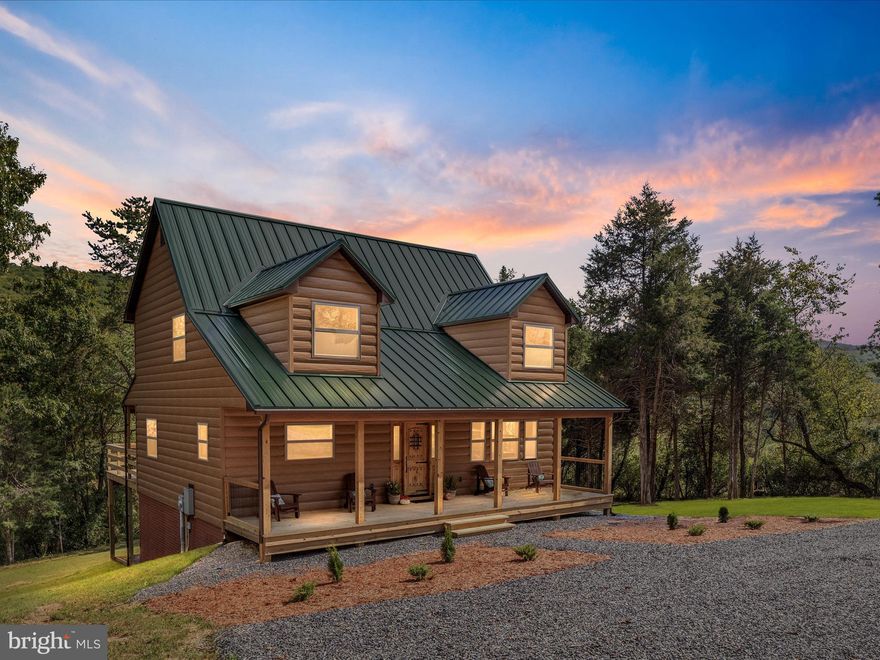 This just-completed 3-bedroom, 2½-bath home sits on 2.61 private acres, just minutes from the Trout Pond Recreation Area.

Built with quality and longevity in mind, the home features maintenance-free metal siding with a 30-year warranty, an H-loc metal roof with a lifetime warranty, and a poured-concrete basement. Inside, enjoy solid hickory kitchen cabinets, pine tongue-and-groove walls throughout, and life-proof flooring in both bathrooms. Modern conveniences include high-speed fiber-optic internet and an 18-GPM well.

Outdoor living is a dream with a large private back deck for entertaining, a cozy covered front porch, and a spacious yard with plenty of room for recreation or future expansion.

Located near Wardensville, WV, and just a short drive to Winchester, VA, this property offers easy access to restaurants, hiking trails, and countless outdoor activities. Perfect as a primary residence, vacation getaway, or investment opportunity—explore this property today and make it your home this fall!
Check out the 3D Tour!