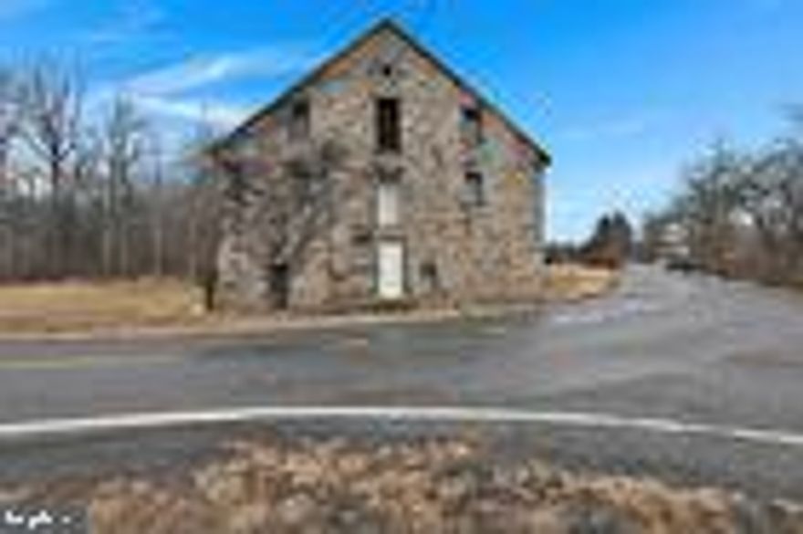 Public Auction Friday, April 11, 2025 @ 5 PM * Successful bidder required a 10% non refundable deposit. Settlement within 45 days. Buyer pays the RE transfer tax. List price does not reflect the final sales price. * This 8.8 +/- acre property would make a great custom home site or personal recreational property. It is perc approved for a sand mound and has an existing structure known as Shubert's Mill. This parcel came from several tracts of land going back to the Penns. Between 1842-1848 Henry Shubert bought the property and between 1848-1852 the mill itself was constructed. It is partially wooded and has 3 ponds and a stream that in the past was stocked with trout. Lots of deer make it a great hunting property as well. Located at the foot of Blue Mountain along a rural road, near Arrow Point Estates, with easy access to Routes 501, I-78.