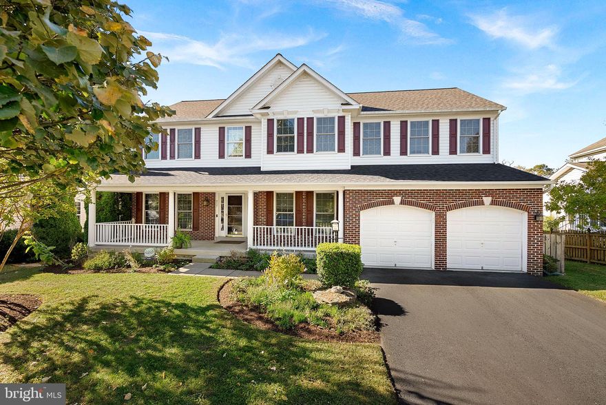 Welcome to this stunning K. Hovnanian Virginia II model in the highly sought-after Hirst Farm community of Purcellville. Offering over 4,400 square feet of beautifully finished living space, this 4-bedroom, 3.5-bath home combines timeless design, comfort, and modern functionality—all in a location that captures the best of Western Loudoun living.
From the moment you arrive, the handsome brick front and wide, welcoming front porch make a lasting first impression. Step inside to a bright, open foyer with high ceilings, elegant finishes, and abundant natural light that fills the home.  The first thing you will notice is the freshly painted walls in a designer neutral color throughout along with the newly sanded and stained hardwood floors and newly installed carpet on the main level.  This home offers thoughtfully designed spaces for both everyday living and entertaining, including formal living and dining rooms, a private home office, and a spacious family room centered around a cozy stone fireplace.  
At the heart of the home, the gourmet kitchen features granite countertops, timeless cabinetry, a center island, and an adjoining breakfast area. Adjacent to the kitchen is walk-in pantry with custom cabinets and drawers.   Just beyond, a light and bright sunroom bump-out creates the perfect space for morning coffee, casual dining, or simply relaxing while overlooking the backyard. Walls of windows flood the space with light and open directly to the newer (2023) trex deck, making indoor-outdoor living effortless.
Upstairs, the luxurious primary suite serves as a true retreat with an adjoining sitting room, dual walk-in closets, and a spa-inspired bath complete with soaking tub and separate shower. Three additional bedrooms and a full bath complete the upper level, offering plenty of comfort and flexibility for family and guests alike.
The finished lower level extends the home’s versatility, featuring a large recreation area, a full bathroom, large bonus room or possible 5th bedroom with plenty of closet space and a custom expanded laundry room and utility space—ideal for organization, crafts, or an additional workstation. The basement also offers generous storage and room to create a home gym or hobby area.
Step outside to your private backyard retreat. A large deck overlooks the fenced-in yard and dedicated garden area, framed by mature trees—perfect for entertaining, gardening, or simply enjoying peaceful evenings outdoors.  Updates include but not limited to, roof (2021) paved driveway (2021), windows-first and second floor (2022), hardwood floor refinishing (2025), HVAC (2022), water heater (2017), new water softener (2025)
Located just minutes from downtown Purcellville and Leesburg, residents enjoy the best of both convenience and charm with easy access to local shops, restaurants, the W&OD Trail, golf courses, and Virginia’s renowned wineries and breweries—all while being moments from Route 7 and the commuter corridor.
Timeless curb appeal, thoughtful design, and modern livability—this is the one you’ve been waiting for.