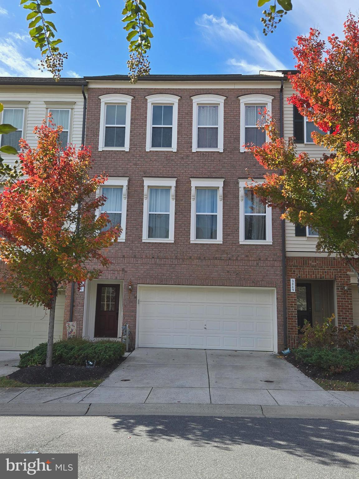 ***SUN. OPEN HOUSE CANCELLED!**Welcome to this stunning brick-front townhome in sought-after Emerson community!
One of the largest and rarest models, this home offers expansive 10-foot ceilings on the main level, creating a lofty and open atmosphere, complemented by walls of oversized windows that flood the space with natural light + glass door opening to a maintenance free deck. On the upper level, enjoy 9-foot ceilings that further elevate the sense of space. Chef’s dream gourmet kitchen is equipped with premium stainless steel appliances, including a gas cooktop, built-in double oven, microwave, and dishwasher. Ample granite countertops provide generous prep space, with an extra-long serving counter perfect for casual dining or entertaining. Hardwood floors grace the entire main level, adding warmth and sophistication while spacious two-car garage offers storage.. Luxurious primary suite is a true retreat, featuring a cozy sitting area, two walk-in closets, and a custom-tiled bath with dual vanities, a soaking tub, and a separate shower with a seat. Convenient laundry room is located on the upper level as well. Situated on a quiet cul-de-sac, this home provides ultimate privacy with a unique back layout, offering sweeping, serene views of lush green space, mature trees, and a peaceful pond — your personal oasis of tranquility. The interior is freshly painted in a custom neutral palette with new, high-quality carpet throughout. The fully finished daylight basement opens to a custom paver patio with a sitting wall, offering additional outdoor living space for relaxation or entertaining. There is new A/C unit installed in 2024
In addition to the impressive features inside the home, the Emerson community offers fantastic amenities, including pools, tennis courts, clubhouse, playgrounds, and walking trails making it a perfect place to call home.
With the prime location in a cul-de-sac, this home blends privacy and community living seamlessly. Don’t miss the opportunity to own this rare gem—an inviting, peaceful retreat just minutes from shopping, dining, schools, and easy access to major roads ***SPECIAL FINANCING is available for this home for lower interest rate/closing cost Credit!**