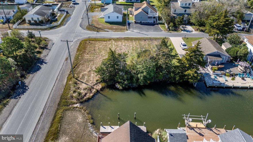 PICS ARE OF BOTH LOTS. Waterfront building lot in much sought after Cape Isle of Wight in West Ocean City. Corner lot #1. Direct Access to the open Bay and the Inlet. Build your waterfront dream home! Just minutes to Ocean City Beaches, Assateague Island, shopping, dining etc! 15 Minutes to Ocean City Inlet by boat and world class fishing!  Lot #2 next door is also available.
Buy both lots! Public Sewer is available. Buyers to do their due diligence as far as permitting etc. Sellers are in the process of getting survey done.