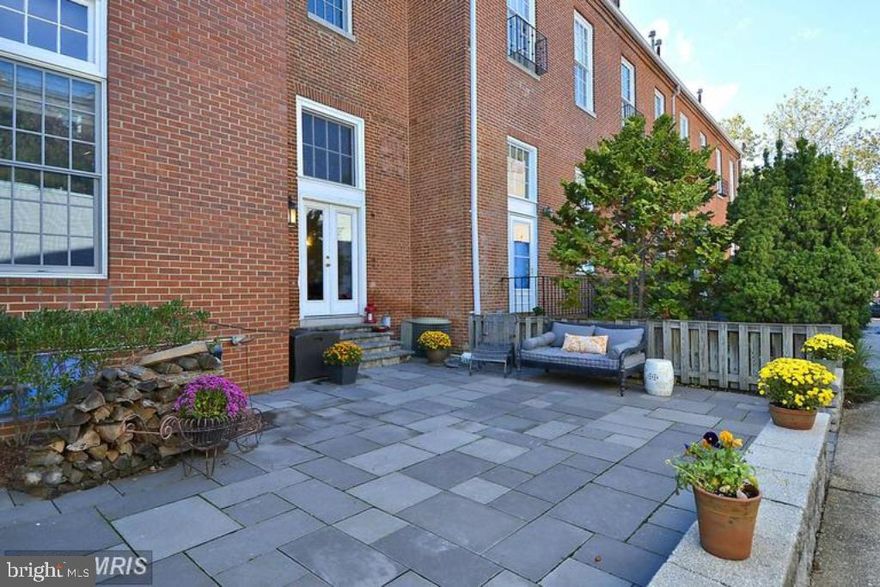 Fantastic opportunity to live in this unique historic Otterbein neighborhood town home with all the modern conveniences. Main level has chef s kitchen with stainless steel appliances, granite countertops, and cherry cabinets, bright and sunny living area with hardwood floors and exposed brick, and half bath. Upper level has large bedroom (more gorgeous hardwoods and exposed brick) with another full bath   completely renovated. Second bedroom has another full bath with large loft. Finished basement contains another living area with 2nd kitchen and 3rd full bath. TWO large private outdoor living areas all within a locked gate for security. One assigned parking spot, 2 guest passes, and lots of street parking - up to 4 street stickers available through the city. Pool bond comes with the property to the Otterbein Swim club just across the street.  Newer A/C 5,   new skylight in 2nd upstairs bedroom, HOA recently redid the back fencing and gates.  Home Choice Vouchers accepted. Looking for $132K minimum combined income and credit 740+.  Apply through Rent Spree. $50 per adult.
