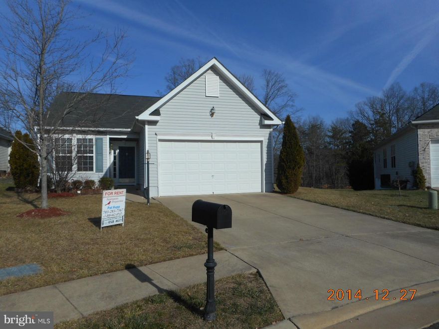 Gated, Country Club living in an over 55 Community, just minutes to Quantico, VRE, 95, and Potomac Mills.  Indoor and outdoor  pool, rec facility, workout  rooms, party rooms, billiard room, amazing facility you need to see to believe (included in rent).  Open floor plan, home backing to woods, gas heat, cooking, and fireplace with two car garage. FIOS. One level living!!!!  No pets!