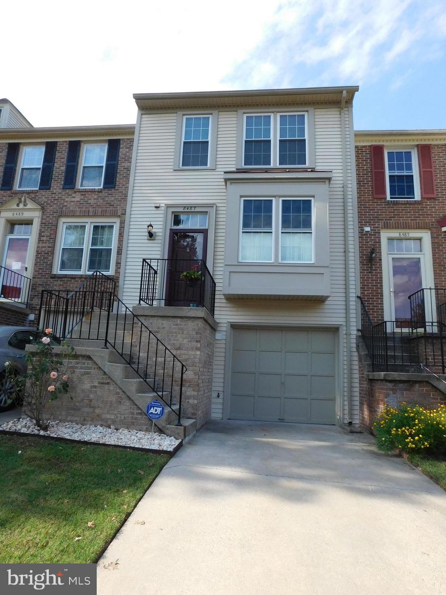 Beautiful, garaged town home within a mile of the VRE!  Hardwood floors on the main level and stairs.  Sweet kitchen with granite kitchen and stainless-steel appliances, boxed window, and pass-through to dining room.  A stepdown living room with a wood burning fireplace.  Two sliding glass doors open to a large deck backing to woods.  The primary has vaulted ceiling, ceiling fan, and three closets.  Primary bath is tiled with double sink vanity.  Tiled hall bath with tub.  Large second bedroom with ceiling fan.  Lower level has third bedroom or recreation room with Murphy bed for convenience allowing for multi-use space  opens to huge paver patio.   Full bath with shower as well as laundry with full sized washer & dryer.   Gorgeous new flooring on lower level.   Yard care is included in the rent.  Pets case by case and an extra $50 per month.  Good credit ONLY.  Incredible location for easy access to I95 and walkable to the VRE and 5 miles from Franconia-Springfield Metro (10 minute drive).